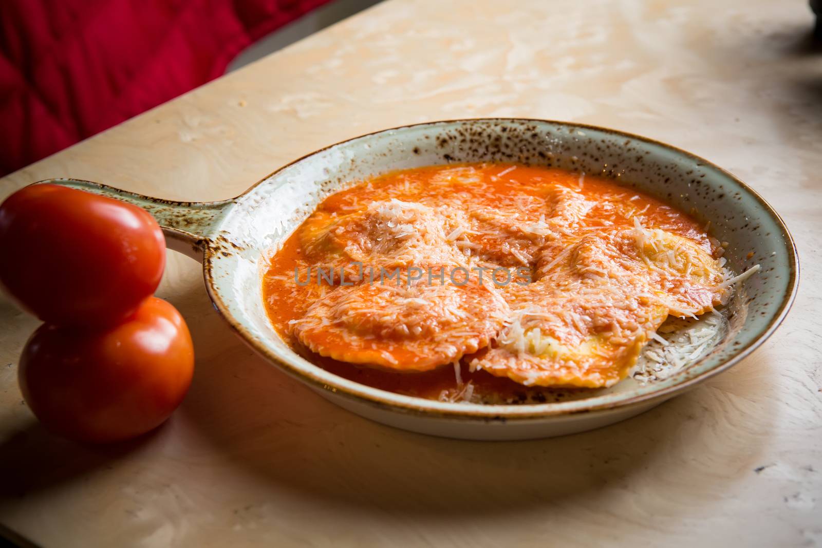 Ravioli in sauce. Lunch. Ravioli Medallions with Marinara Sauce.