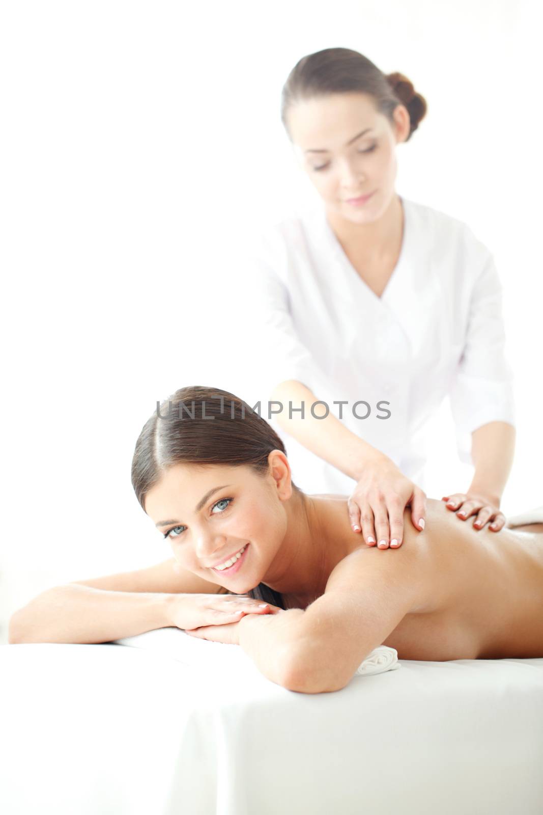 beautiful young woman at spa session