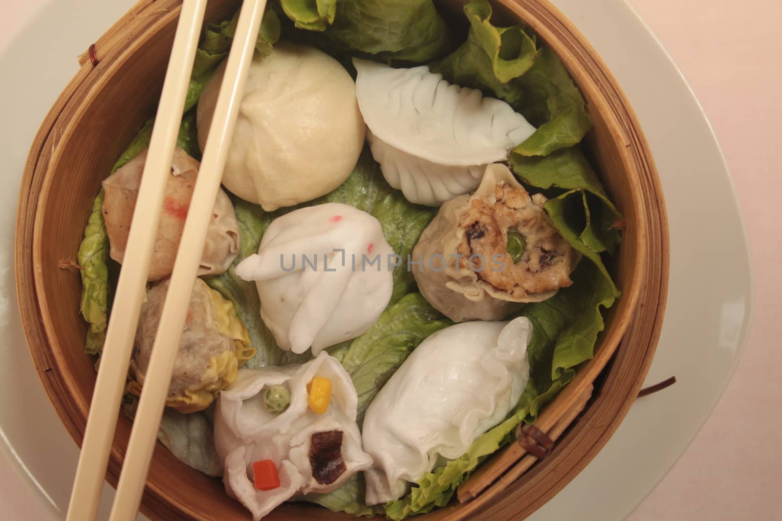 wontons in wooden bowl