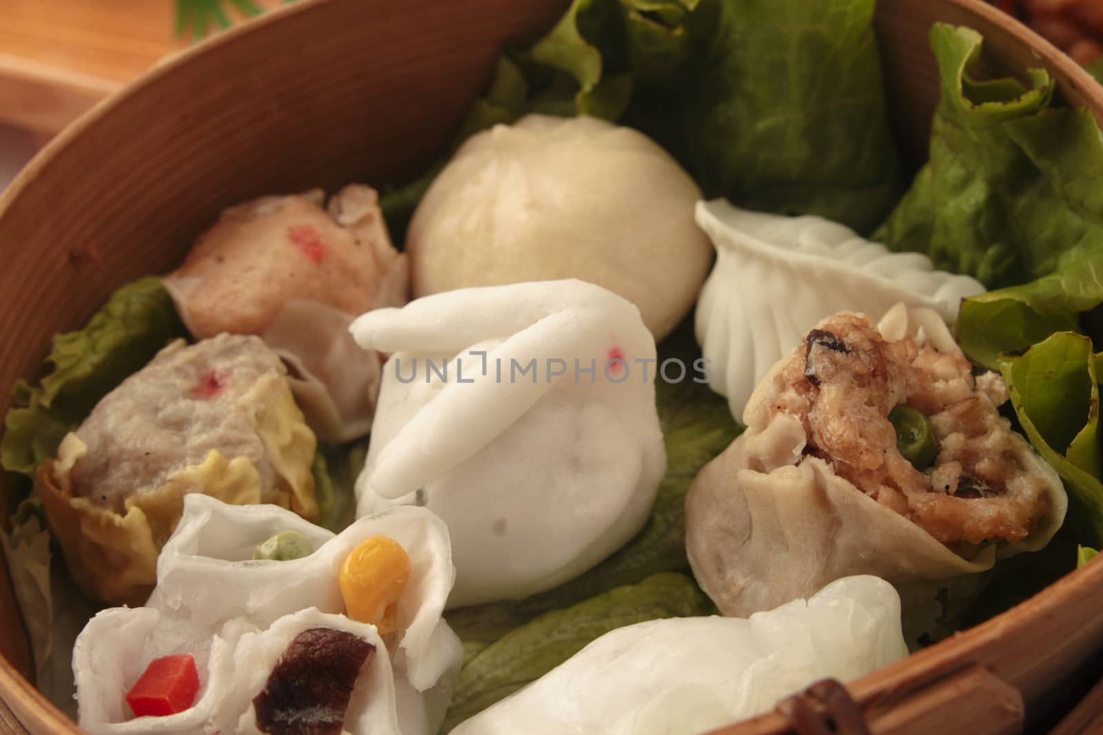 wontons in wooden bowl