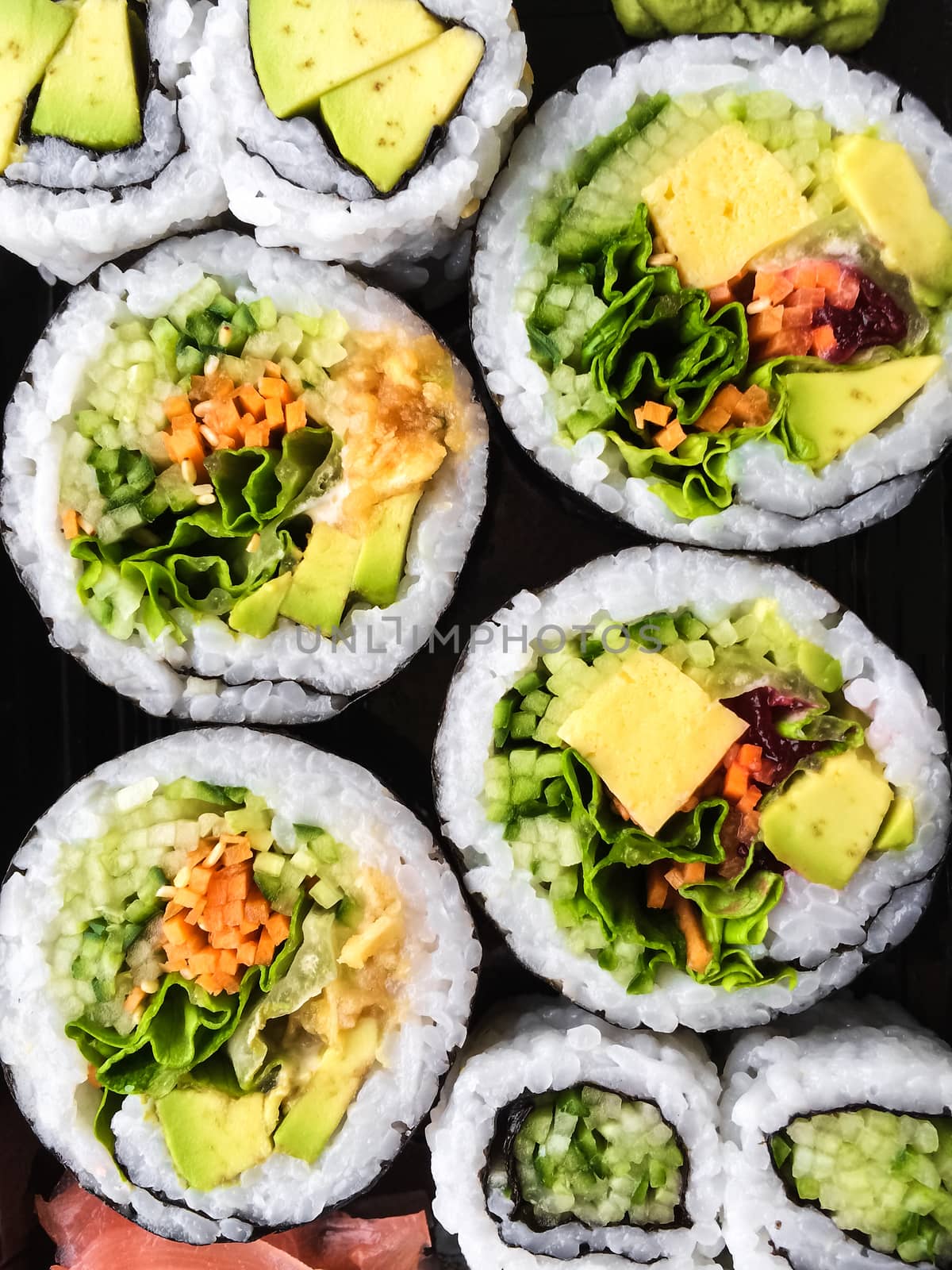 Vegetarian sushi on dark background by anikasalsera