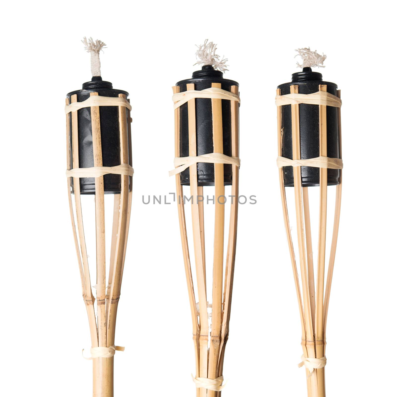 Bamboo torches isolated on white background.