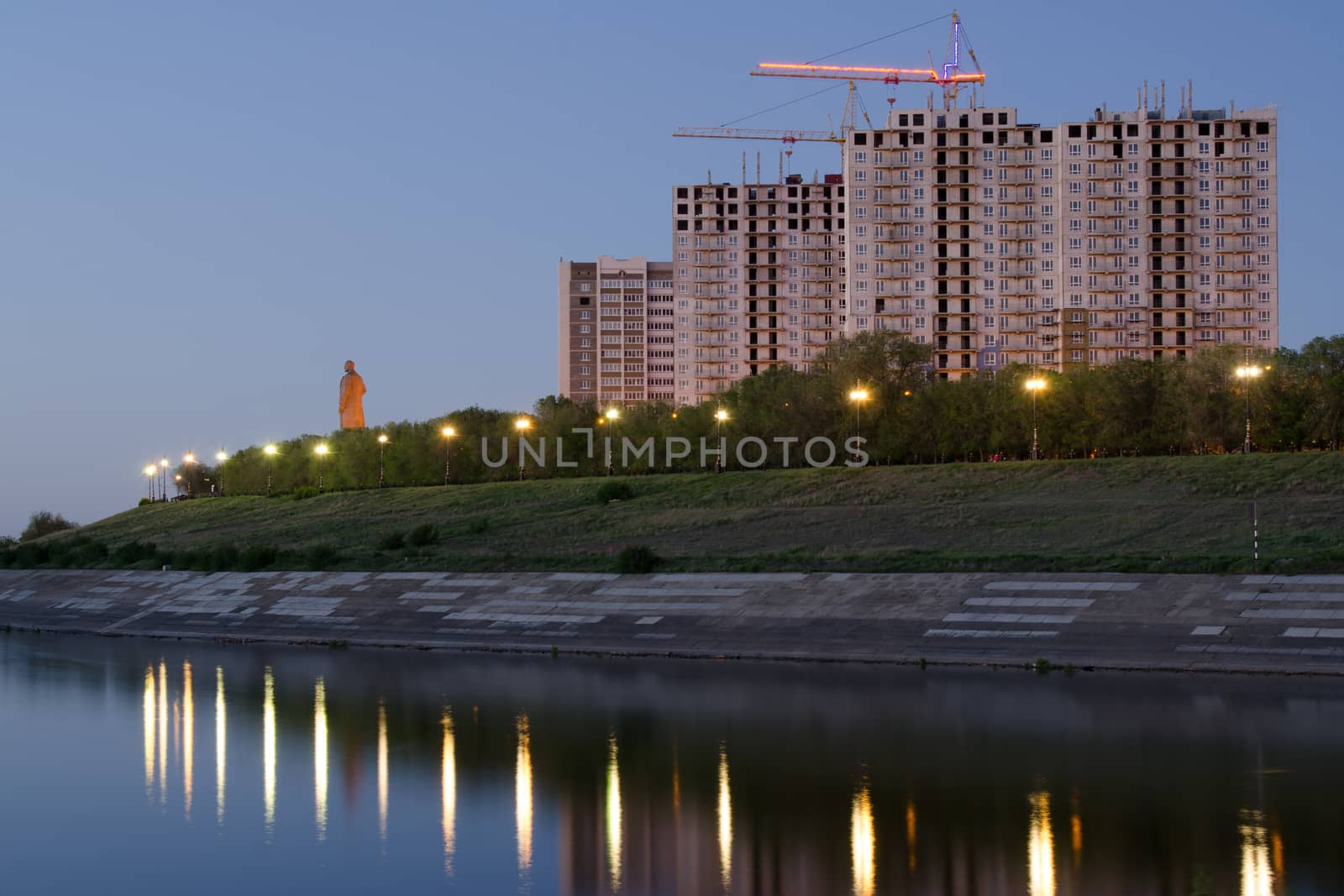 Evening view of the residential complex under construction high-rise buildings on the waterfront of Krasnoarmeysk district of Volgograd