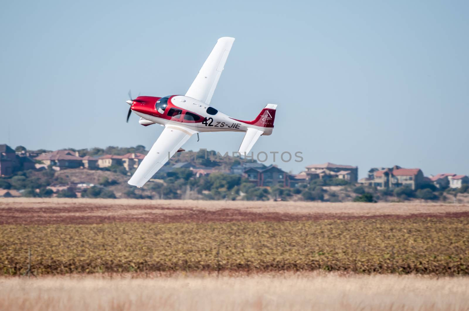 BLOEMFONTEIN, SOUTH AFRICA - MAY 29, 2015: Cirrus SR22 taking off. The 2015 Presidents Trophy Air Race was held at the Tempe Airport from 28 to 30 May 2015. More than 100 light aircraft participated