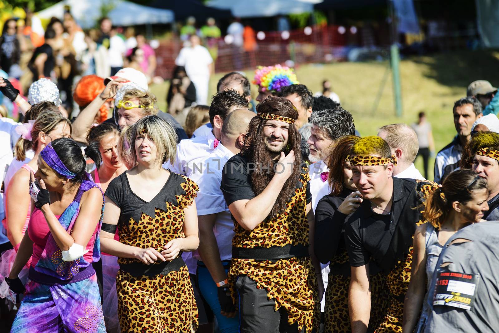 LYON, FRANCE - MAY 24: Crazy group of sportive people all are dressd,  Frappadingue race participating in the event in the Miribel Jonage Park to Lyon on May 24, 2015. People from all walks of life participated in the run.