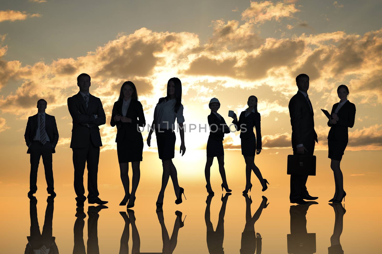 Young attractive business people with at camera on abstract sky background