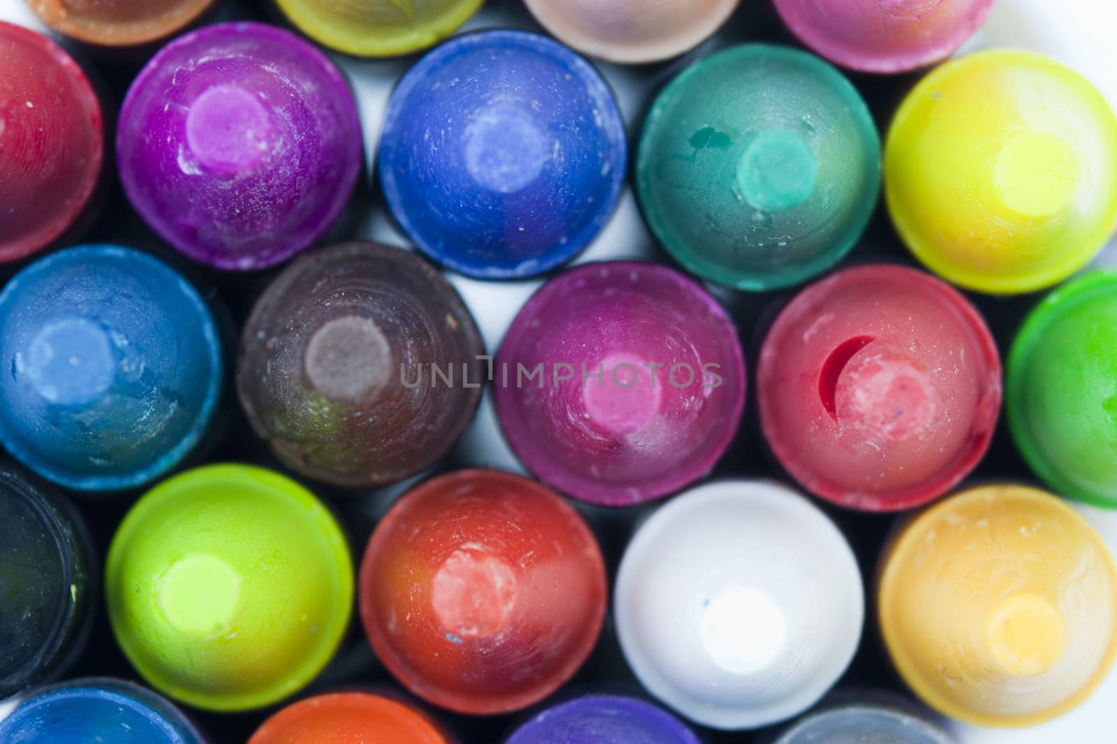 Close up of different coloured crayons