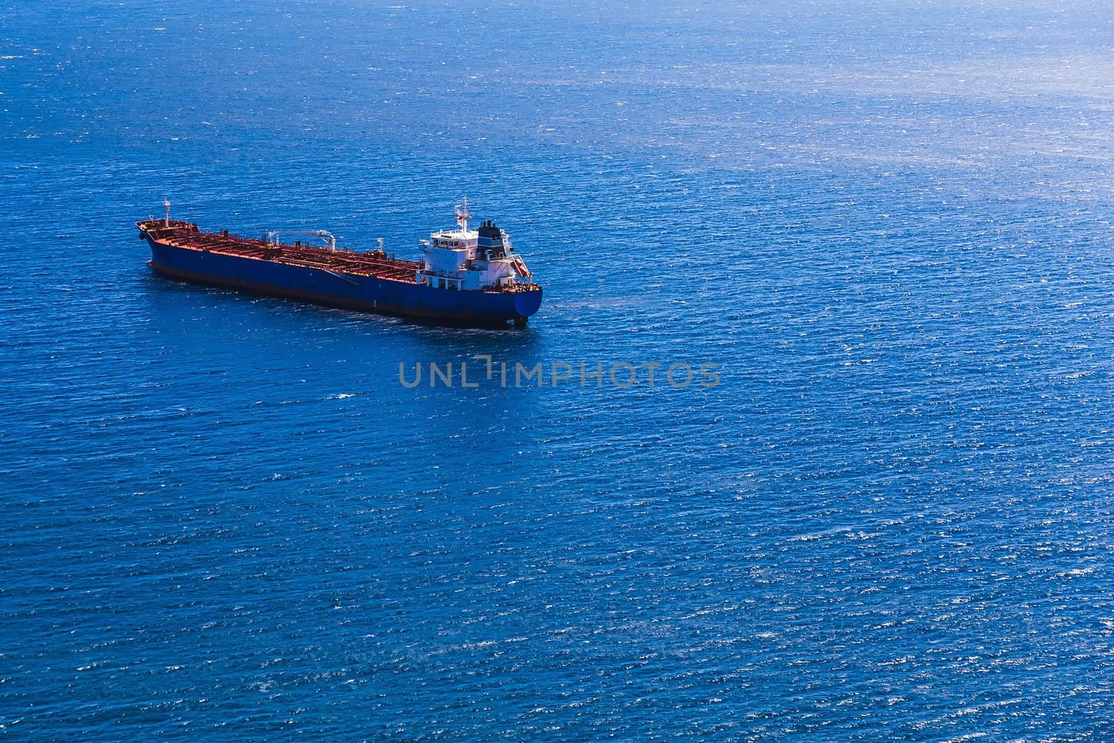 Empty container cargo ship in the open ocean or sea