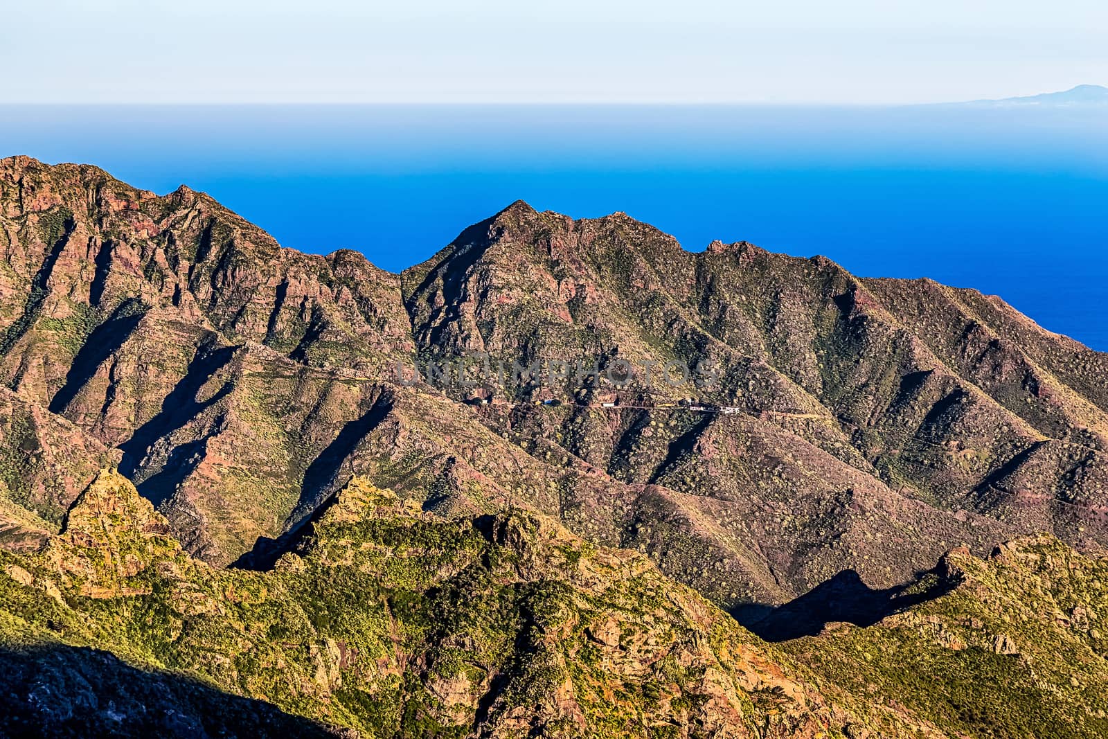 Coast or shore of Atlantic ocean with  mountain or rock and  sky with horizon in Tenerife Canary island, Spain at spring or summer