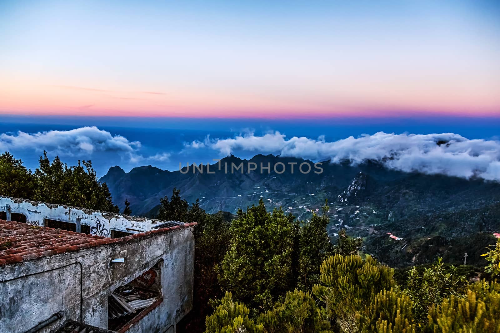 Mountain and clouds landscape with sky horizon and old building in Tenerife Canary island, Spain