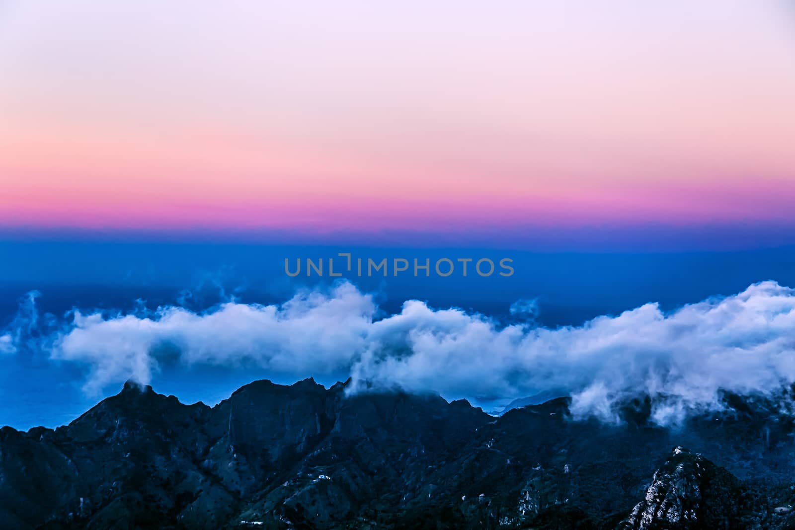 Landscape with white and blue clouds over mountain and sky horizon in Tenerife island, Spain