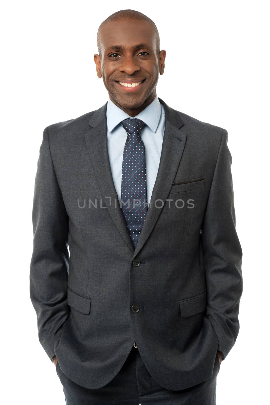 Confident businessman posing by stockyimages