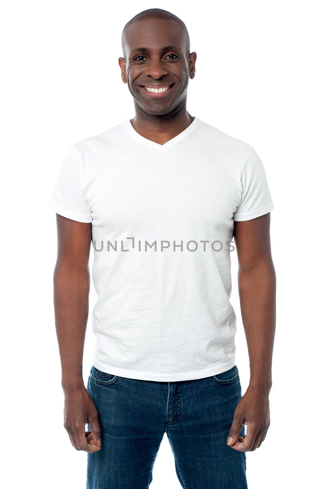 Image of a relaxed man posing over white