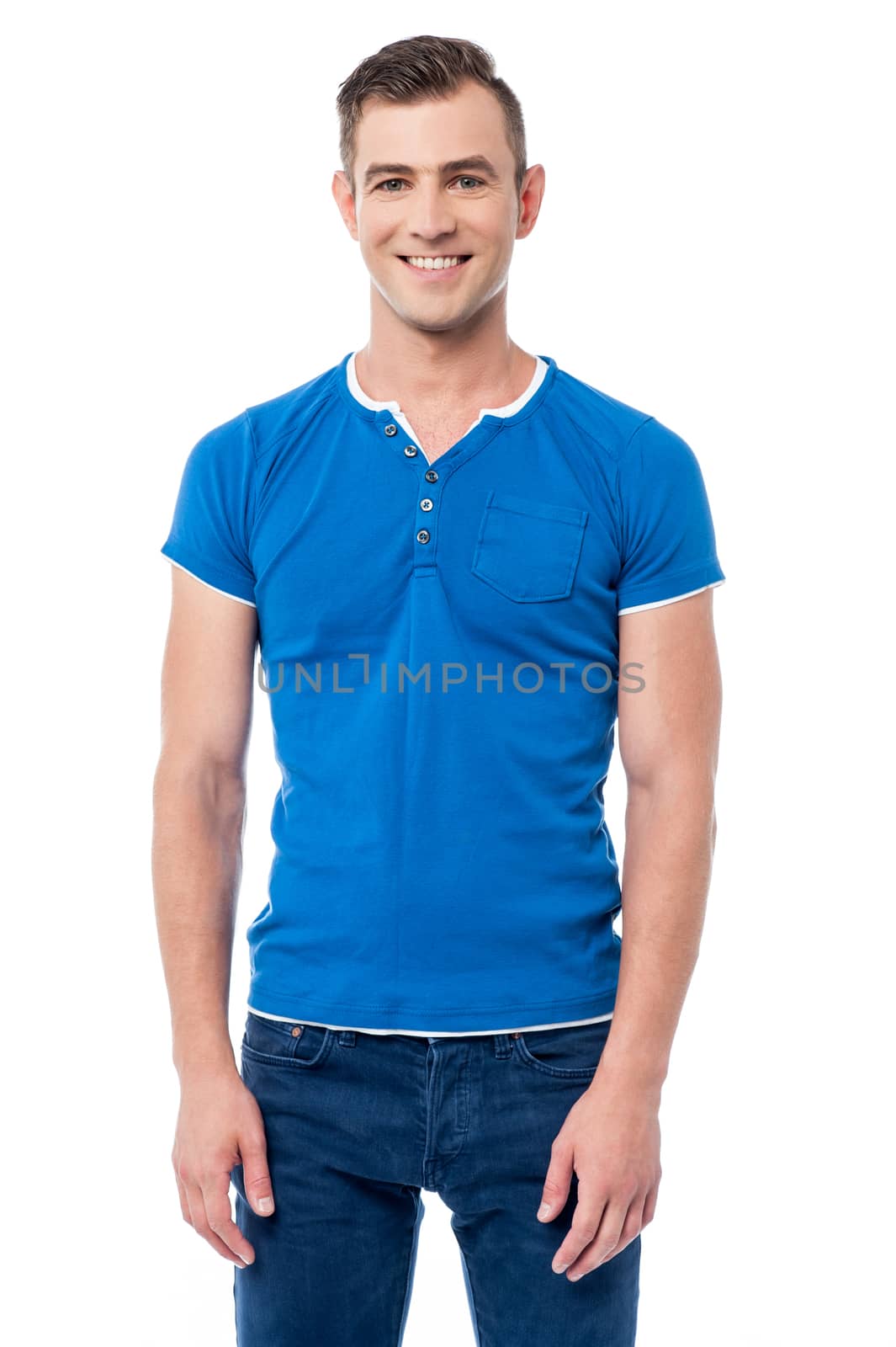 Smiling man posing casualy by stockyimages