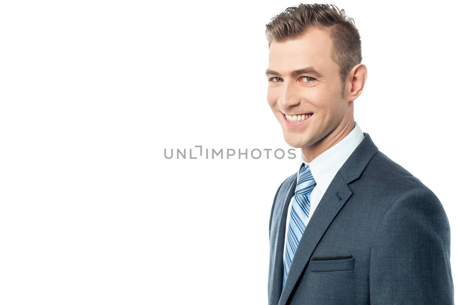 Side pose of cheerful businessman over white