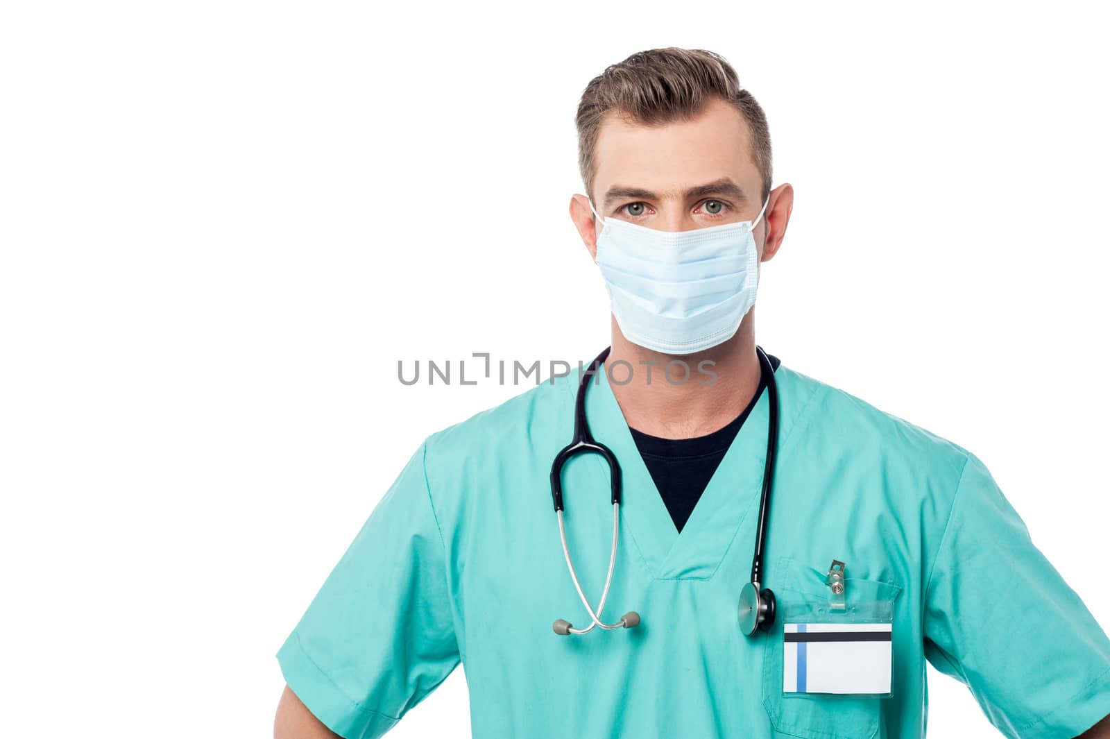 Male doctor posing with surgical mask