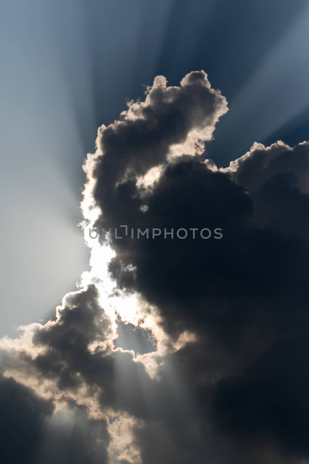 Clouds close up in sky before rain with sunray