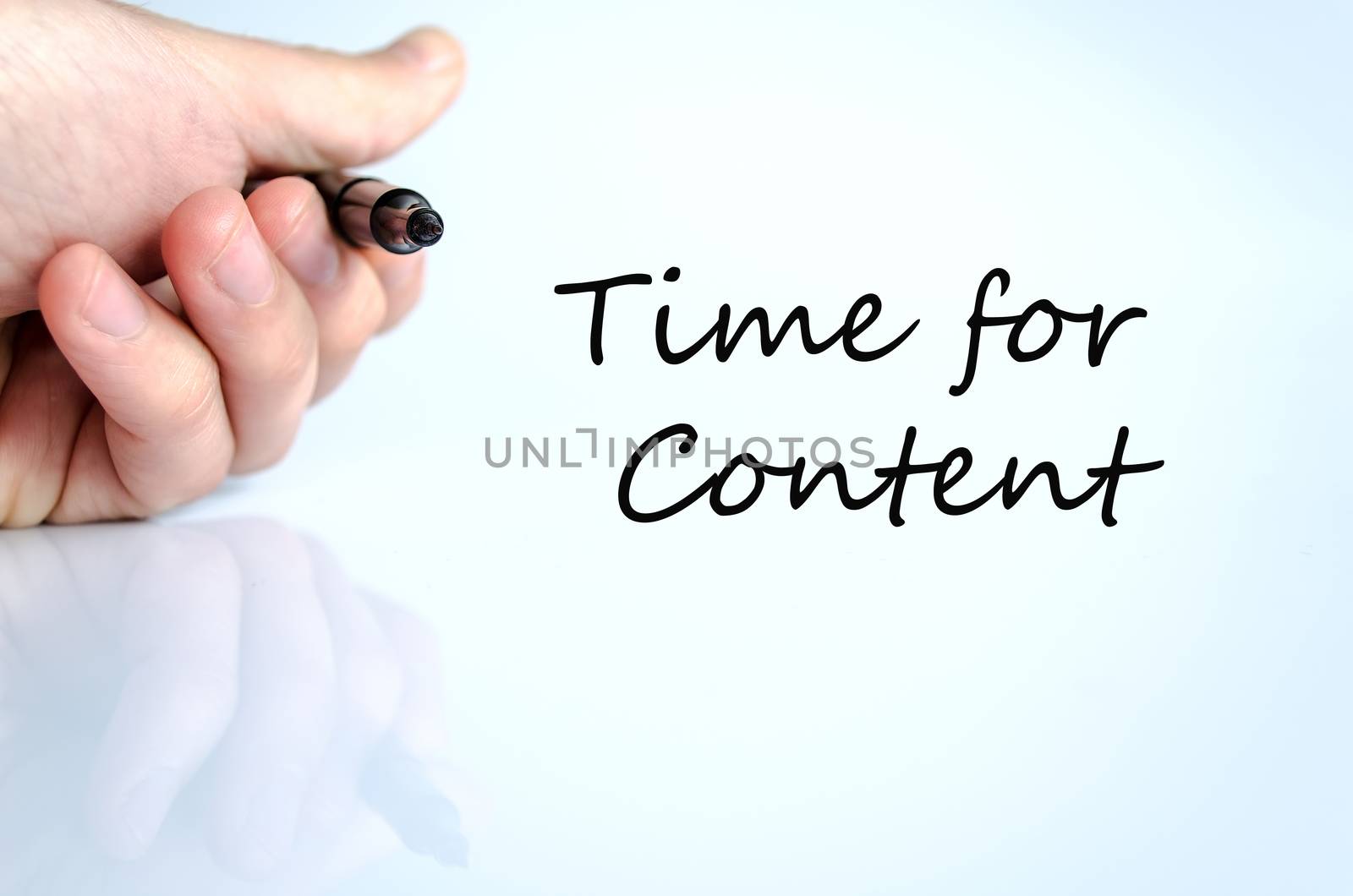 Pen in the hand isolated over white background Time for content Concept