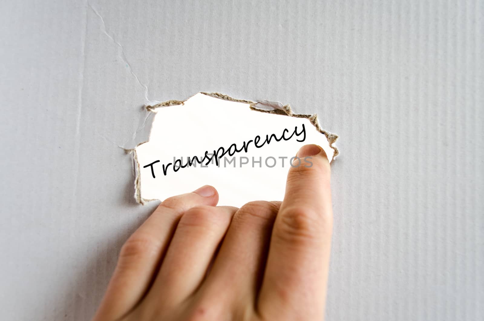Hand and text on the cardboard background Transparency