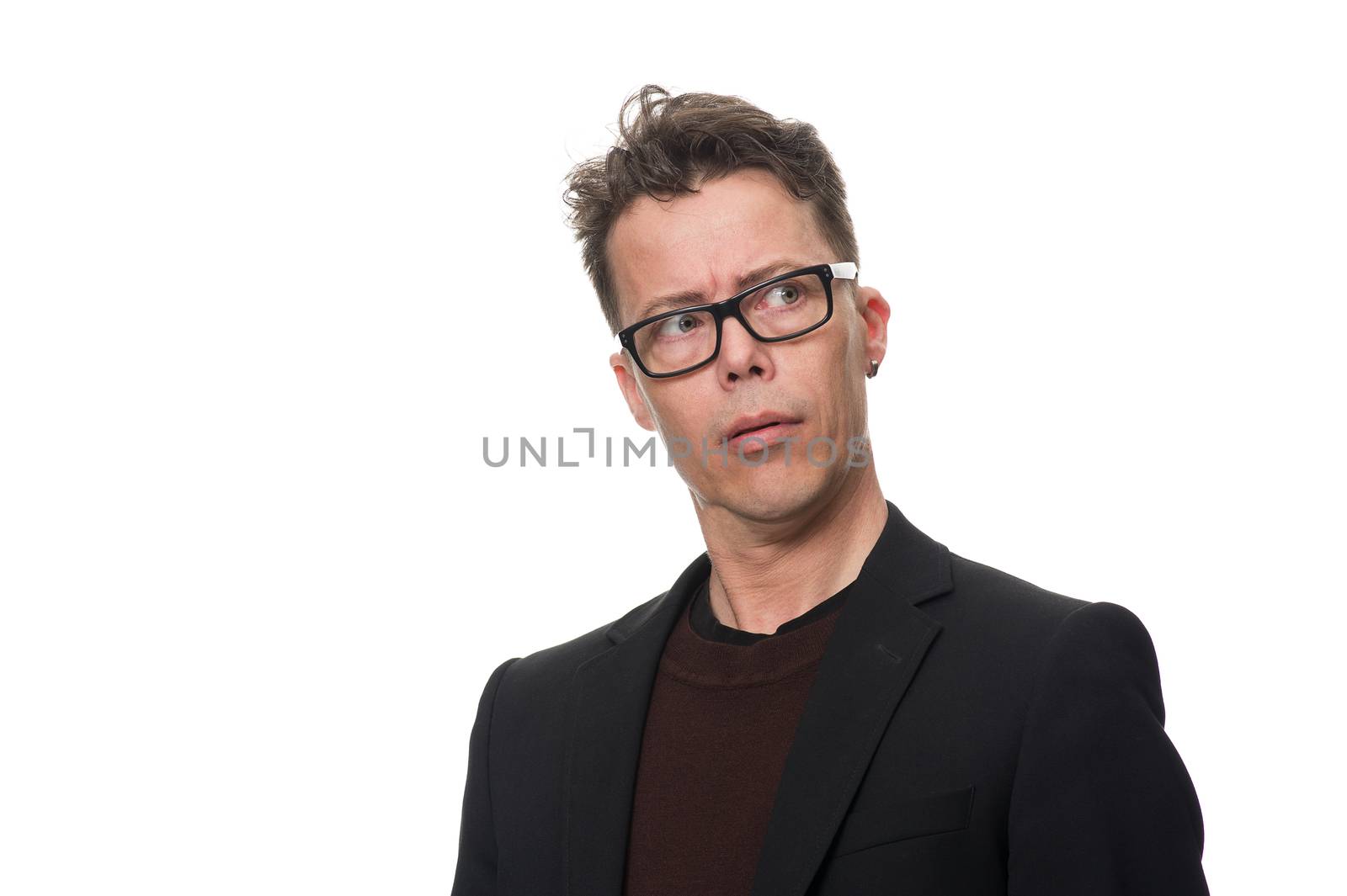 Close up Thoughtful Businessman with Eyeglasses Looking into Distance Seriously Against White Background, Emphasizing Confused Facial Expression.