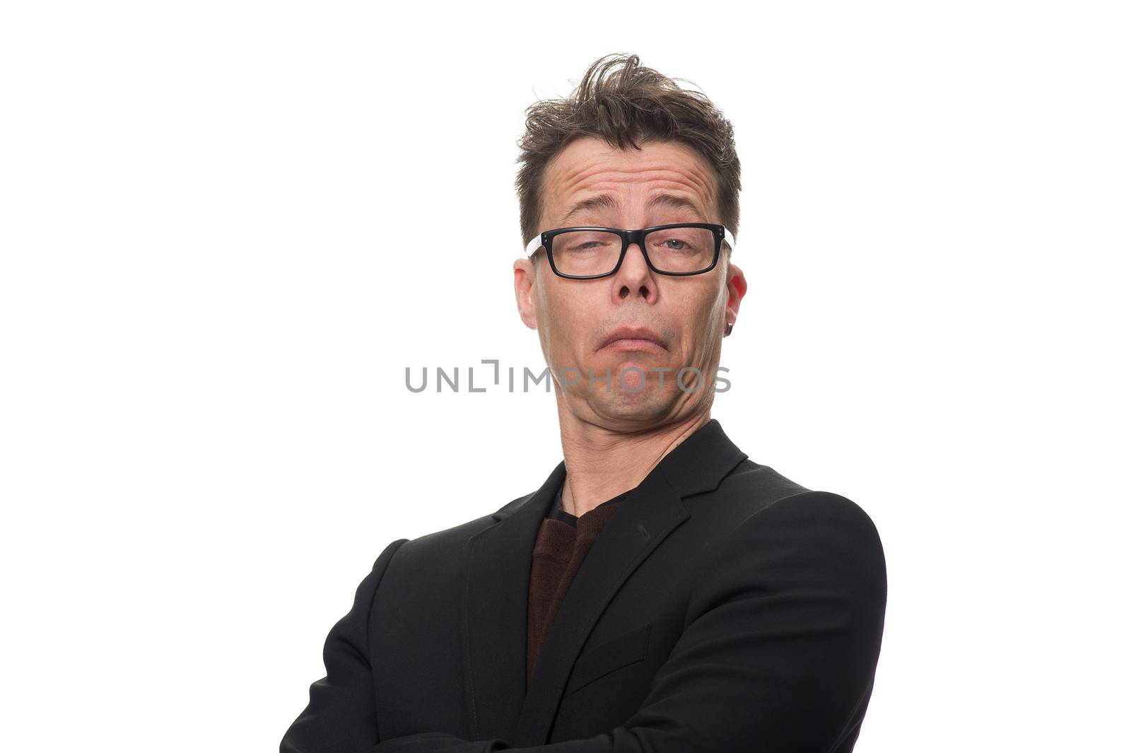 Close up Confident Middle Age Businessman Showing Sceptical Facial Expression While Looking at the Camera. Isolated on White Background.