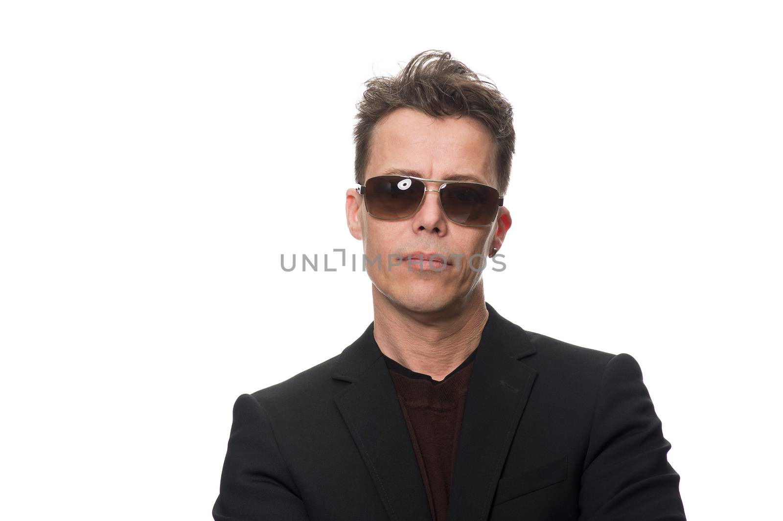 Close up Serious Middle Age Businessman Wearing Sunglasses and Facing at the Camera, Isolated on White Background.