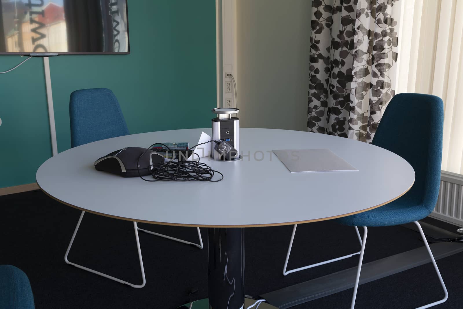 A circular litttle table at a conference room