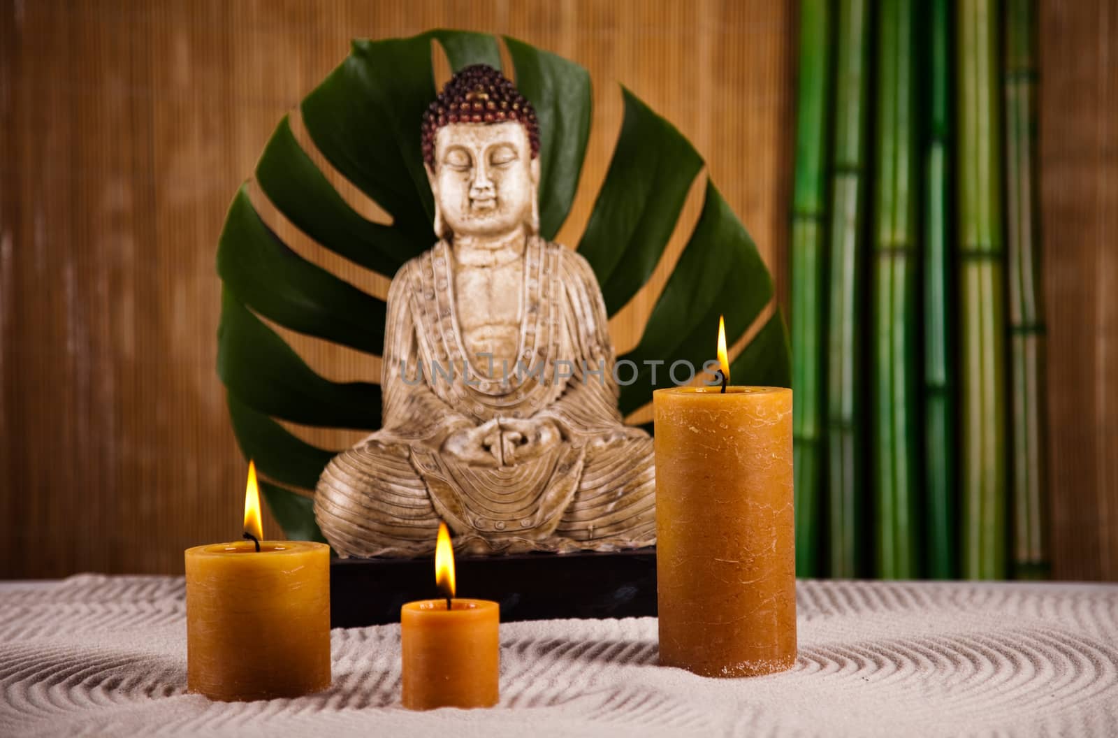 Buddha statue with orchid flower