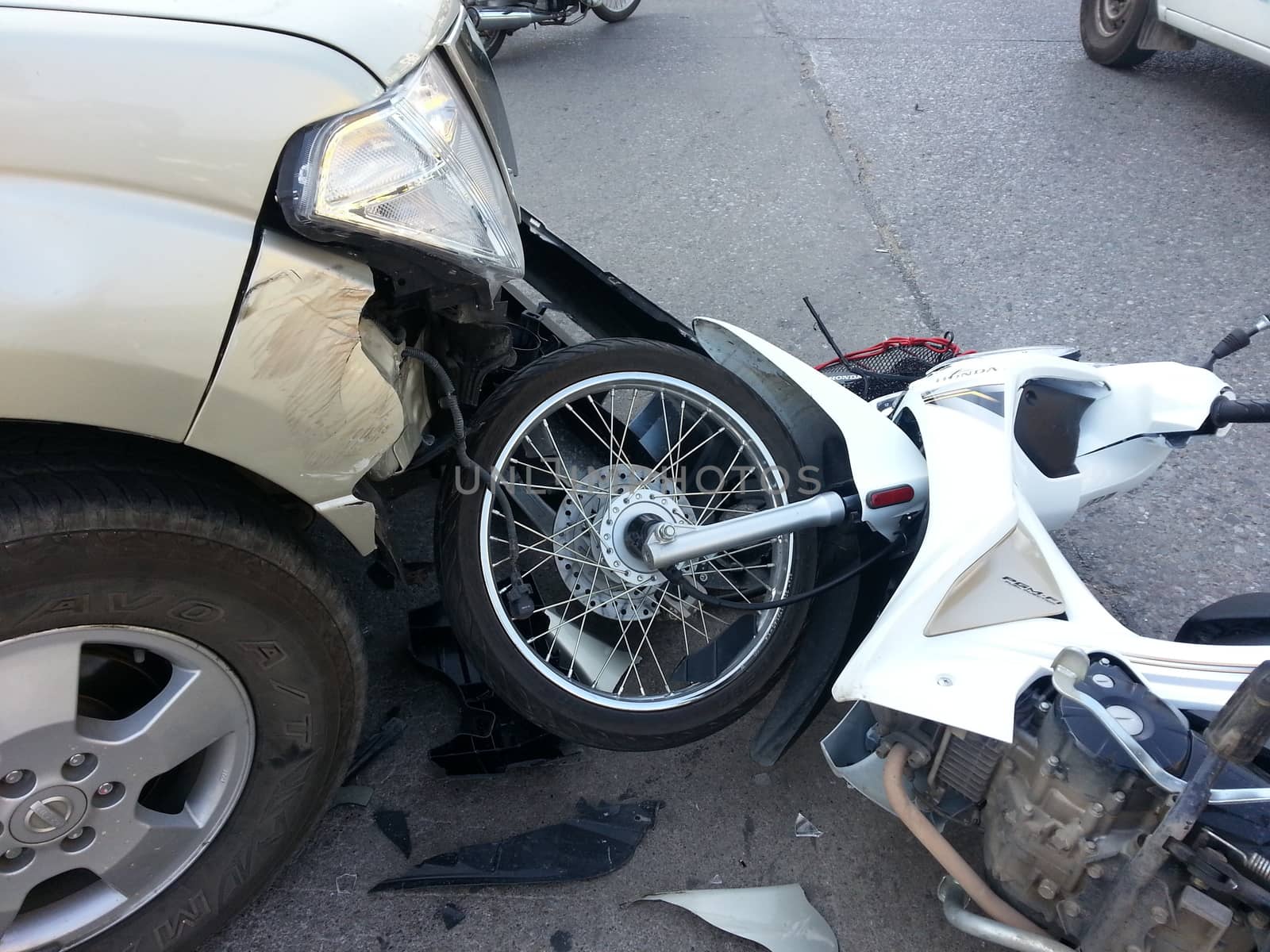 CHIANGMAI, THAILAND-JANUARY 10, 2013: Crash Accident Pickup Truck with Motorcycle at roadside in Chaingmai, Northern Thailand.