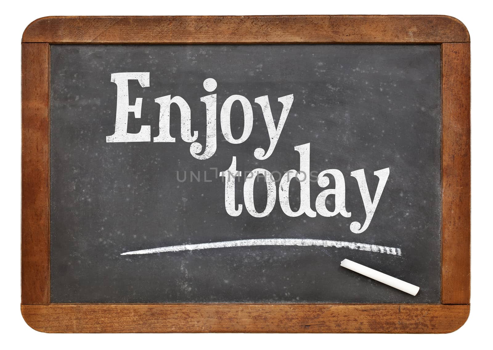 Enjoy today - text on blackboard by PixelsAway