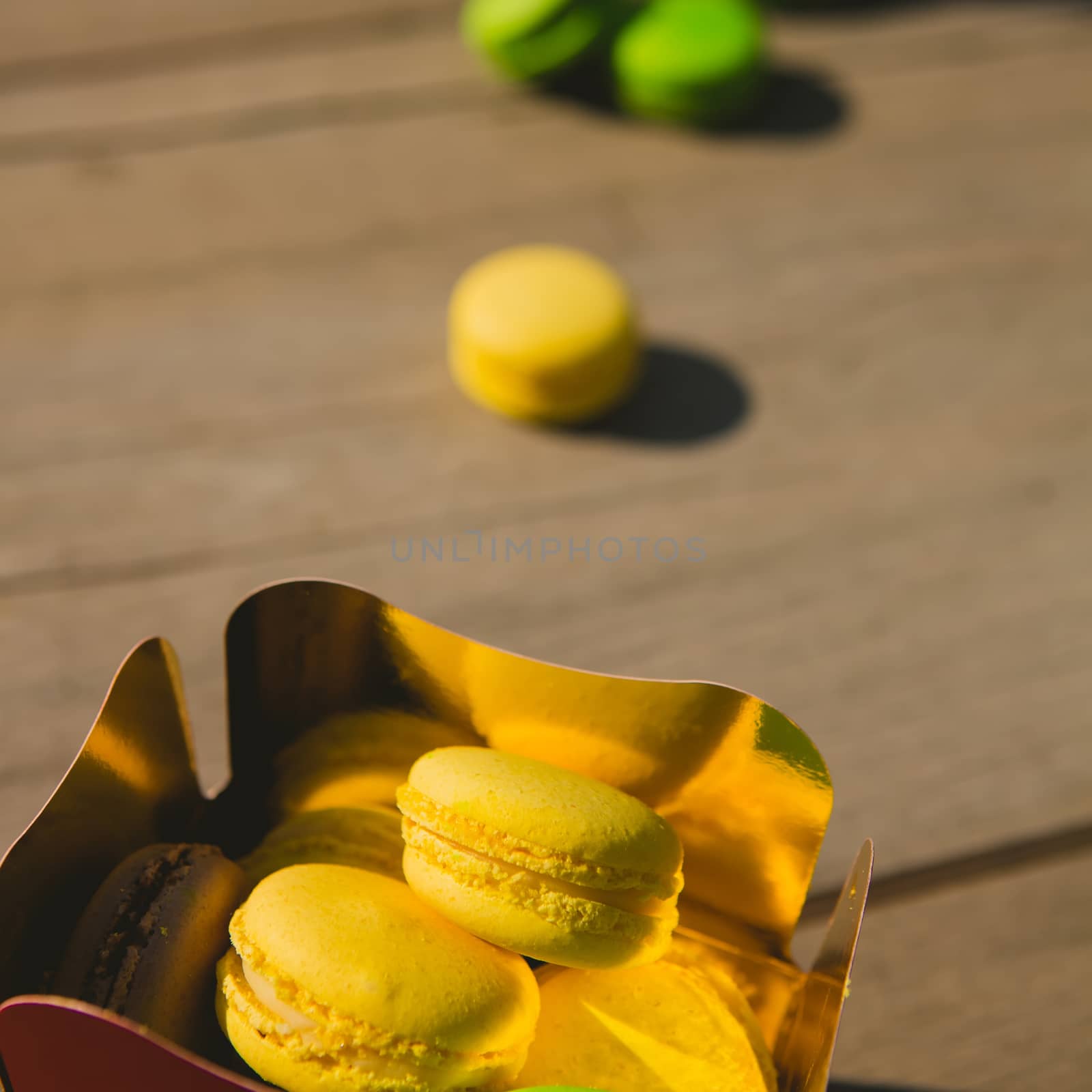 A lot of french colorful macarons. shallow dof