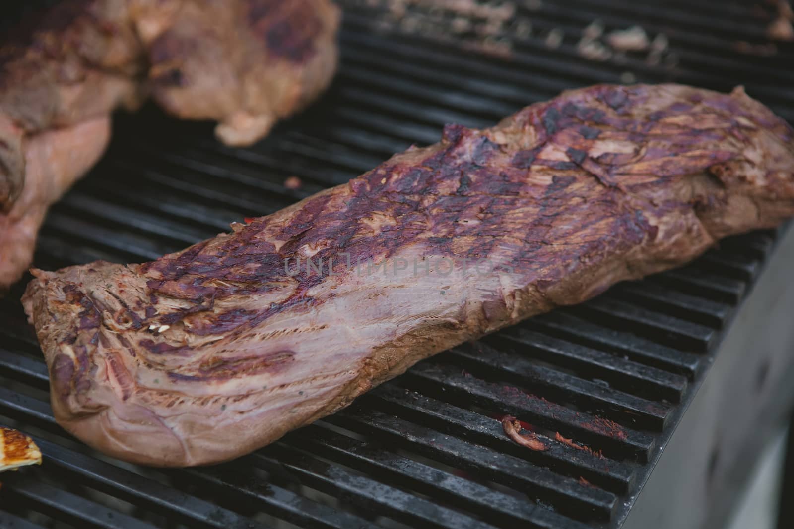 organic beef on the grill. close-up. Shallow DOF.
