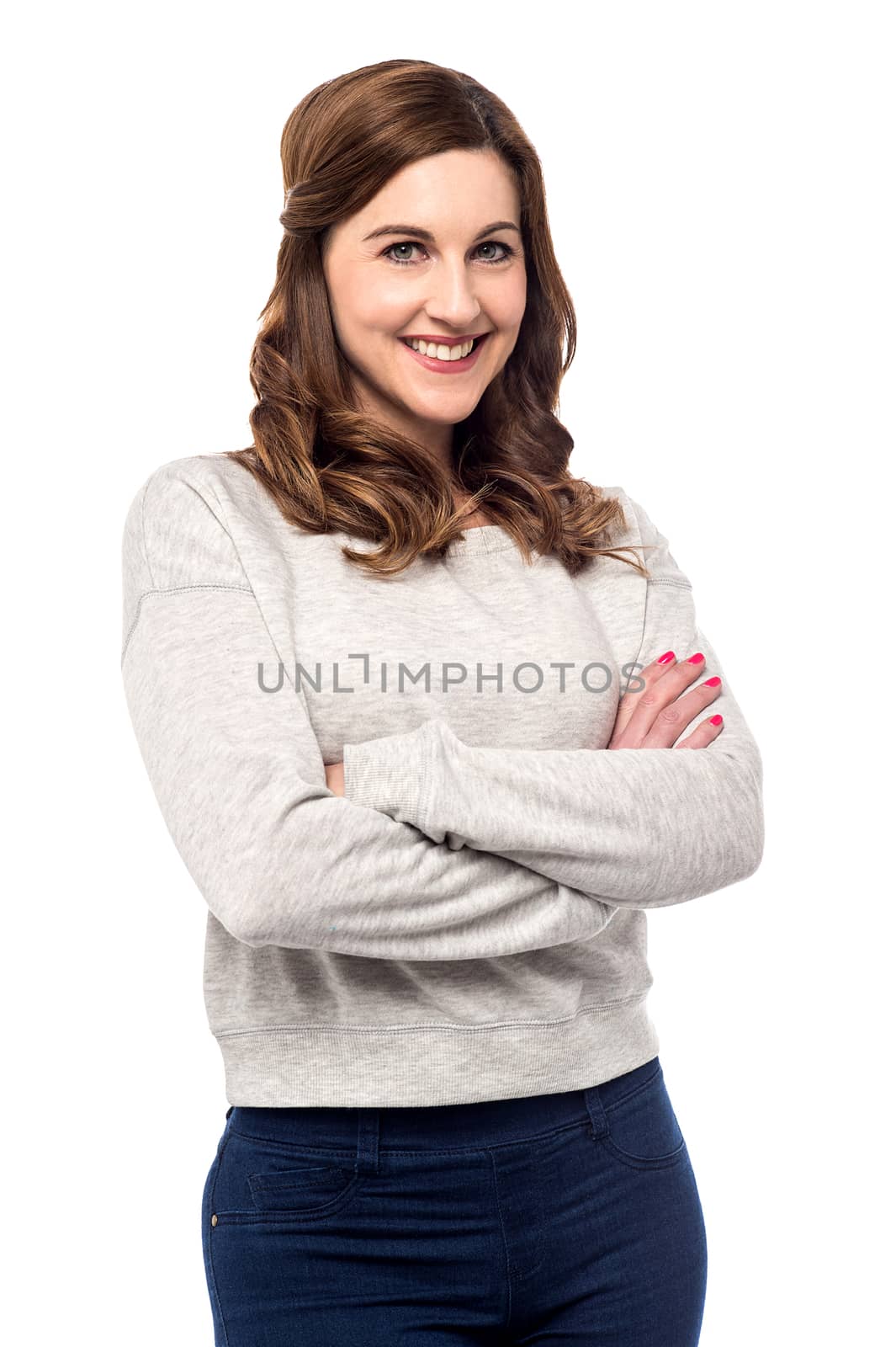 Casual pose of confident woman by stockyimages