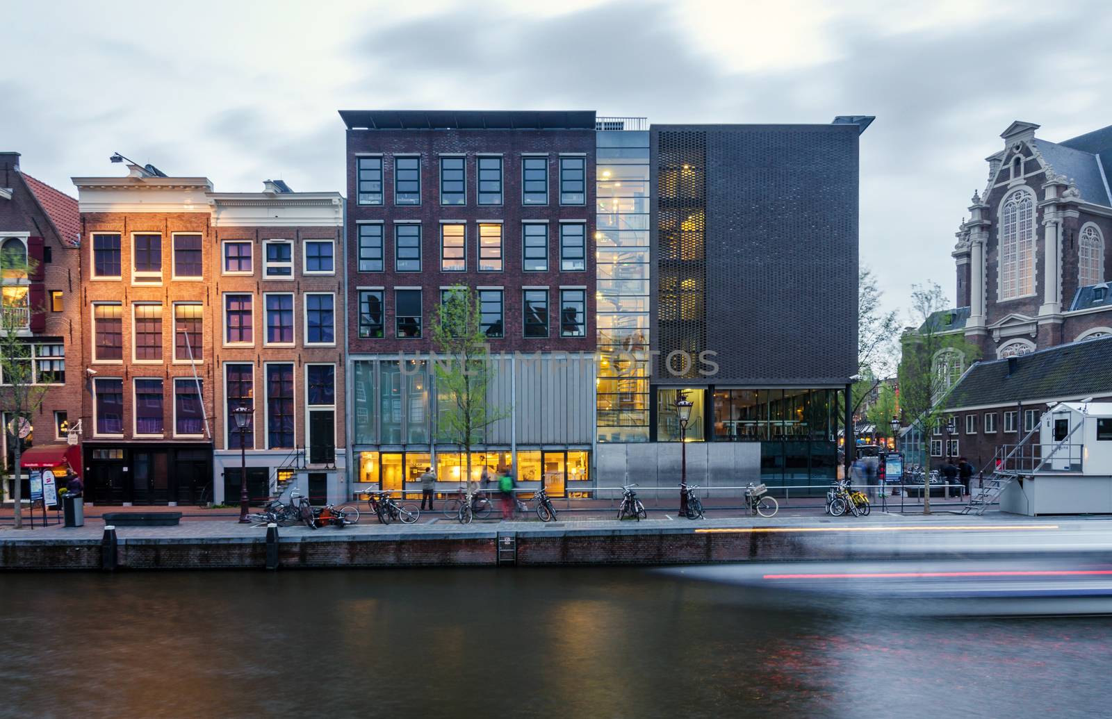 Amsterdam, Netherlands - May 7, 2015: Tourist visit Anne Frank house and holocaust museum in Amsterdam. by siraanamwong