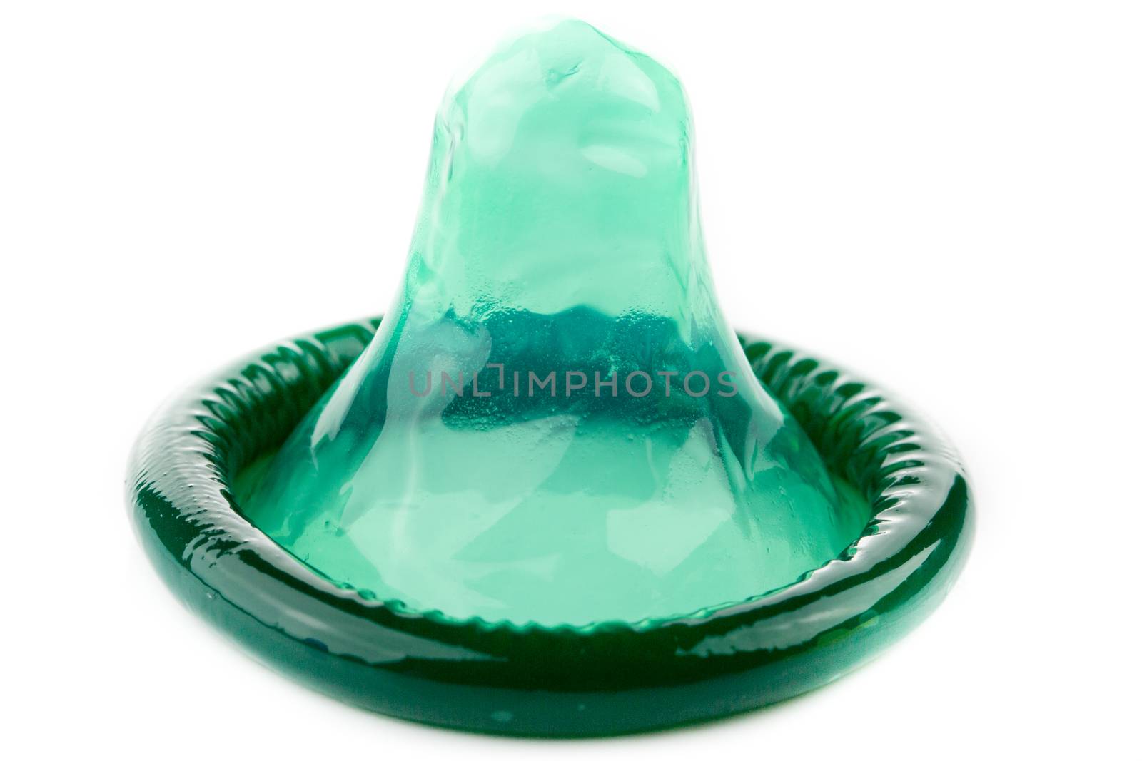 green condom on white background