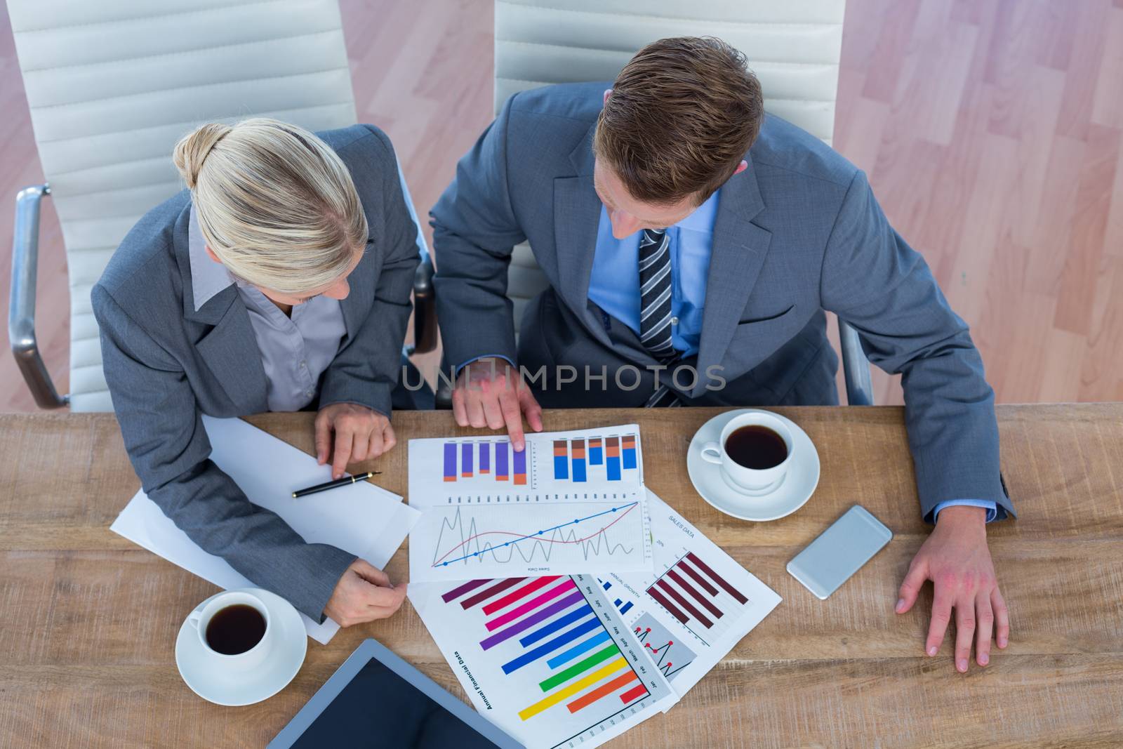 Business people brainstorming together in an office