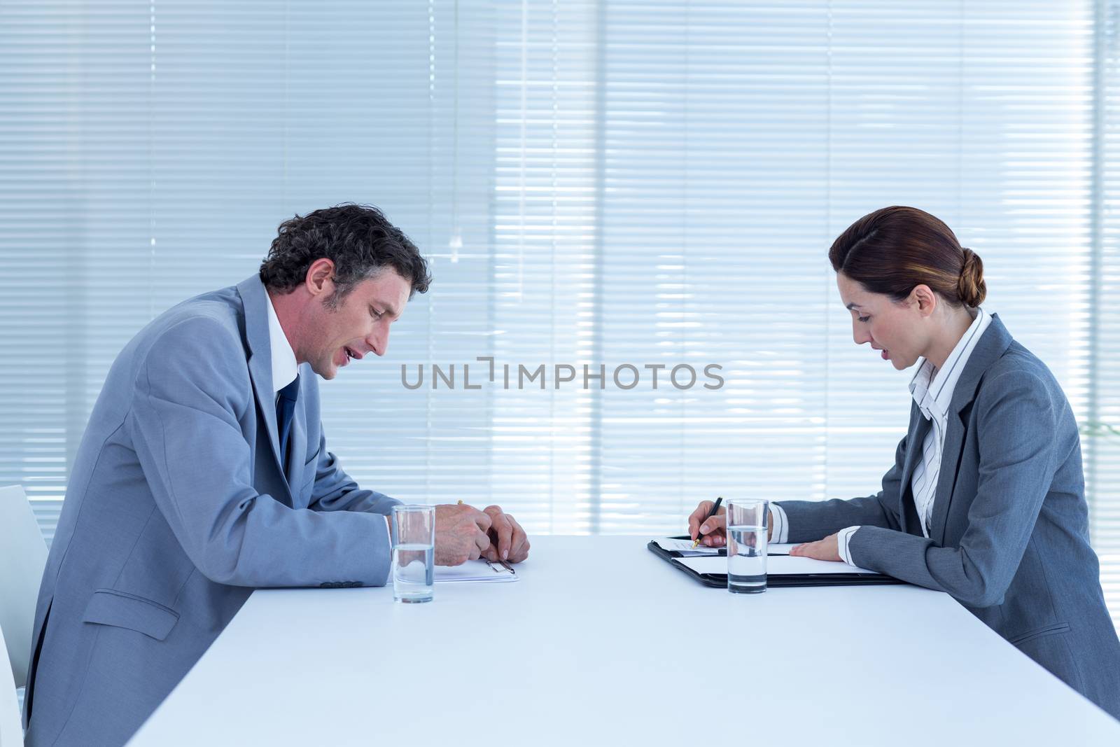 Business people brainstorming together in an office