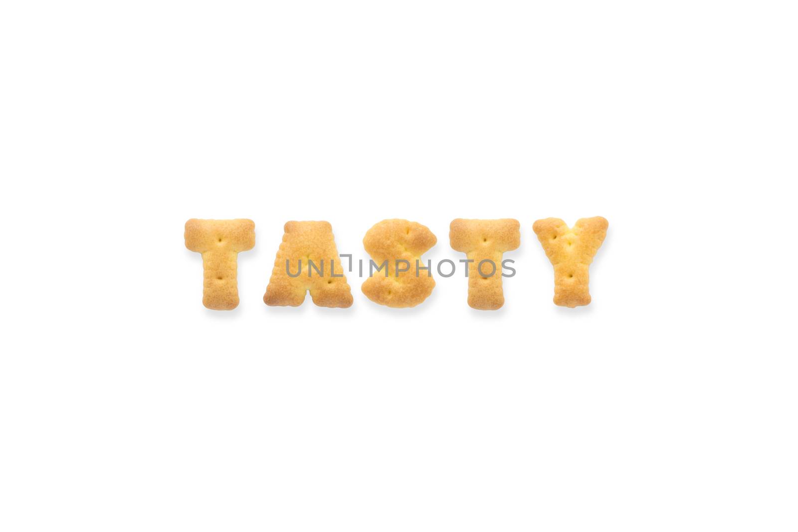 Collage of the capital letters word TASTY. Alphabet cookie biscuits isolated on white background