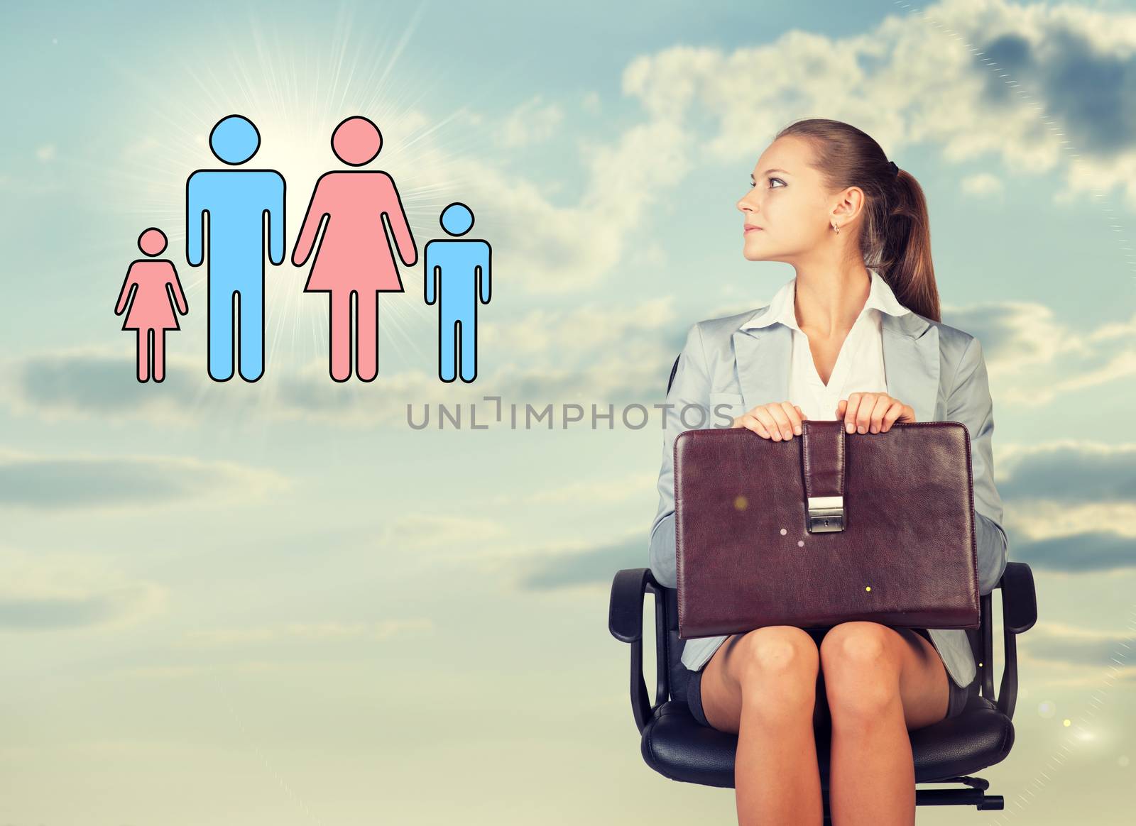 Business woman in skirt, blouse and jacket, sitting on chair and holding briefcase imagines family. Against background of sky and clouds