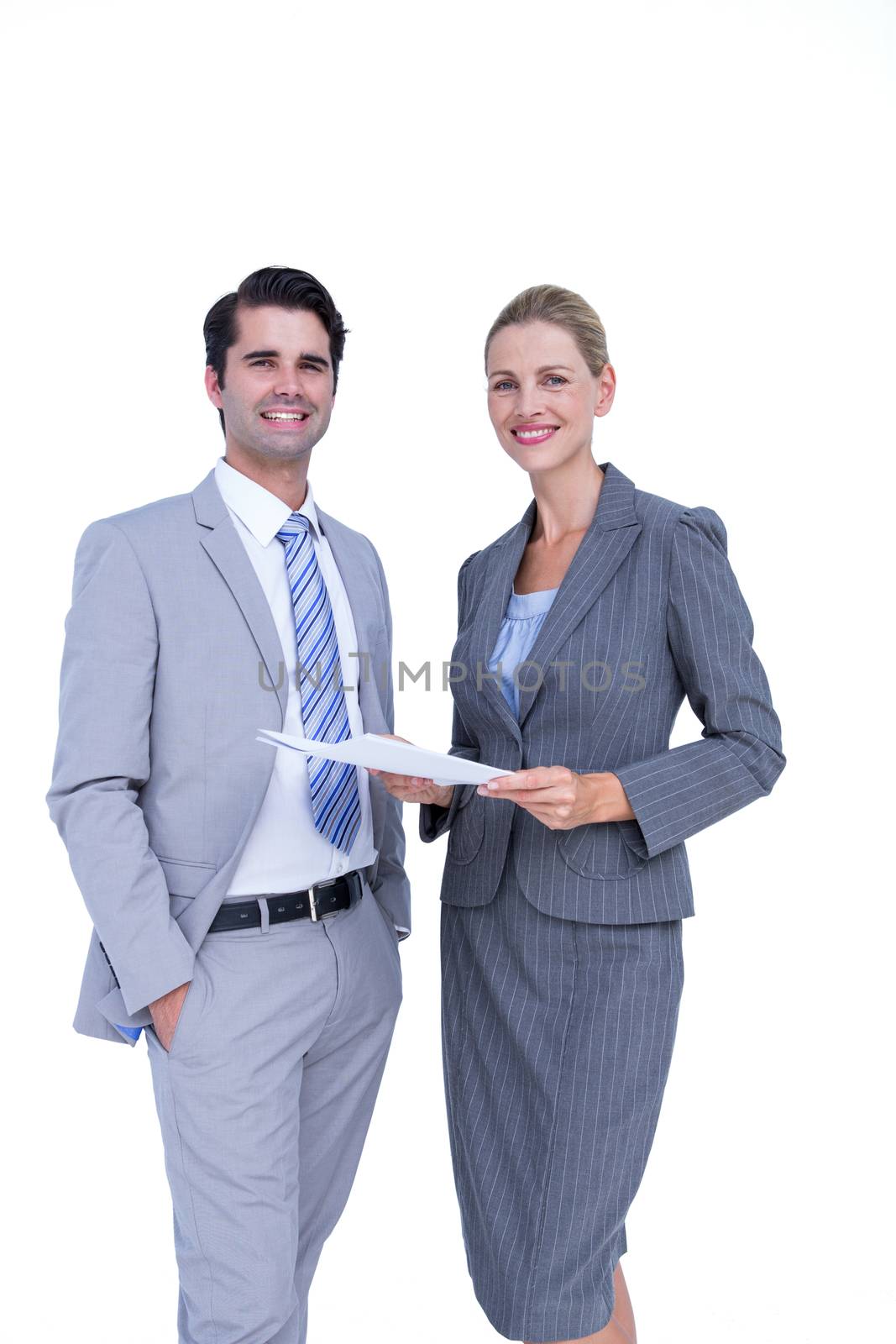 Business people looking at camera on white background