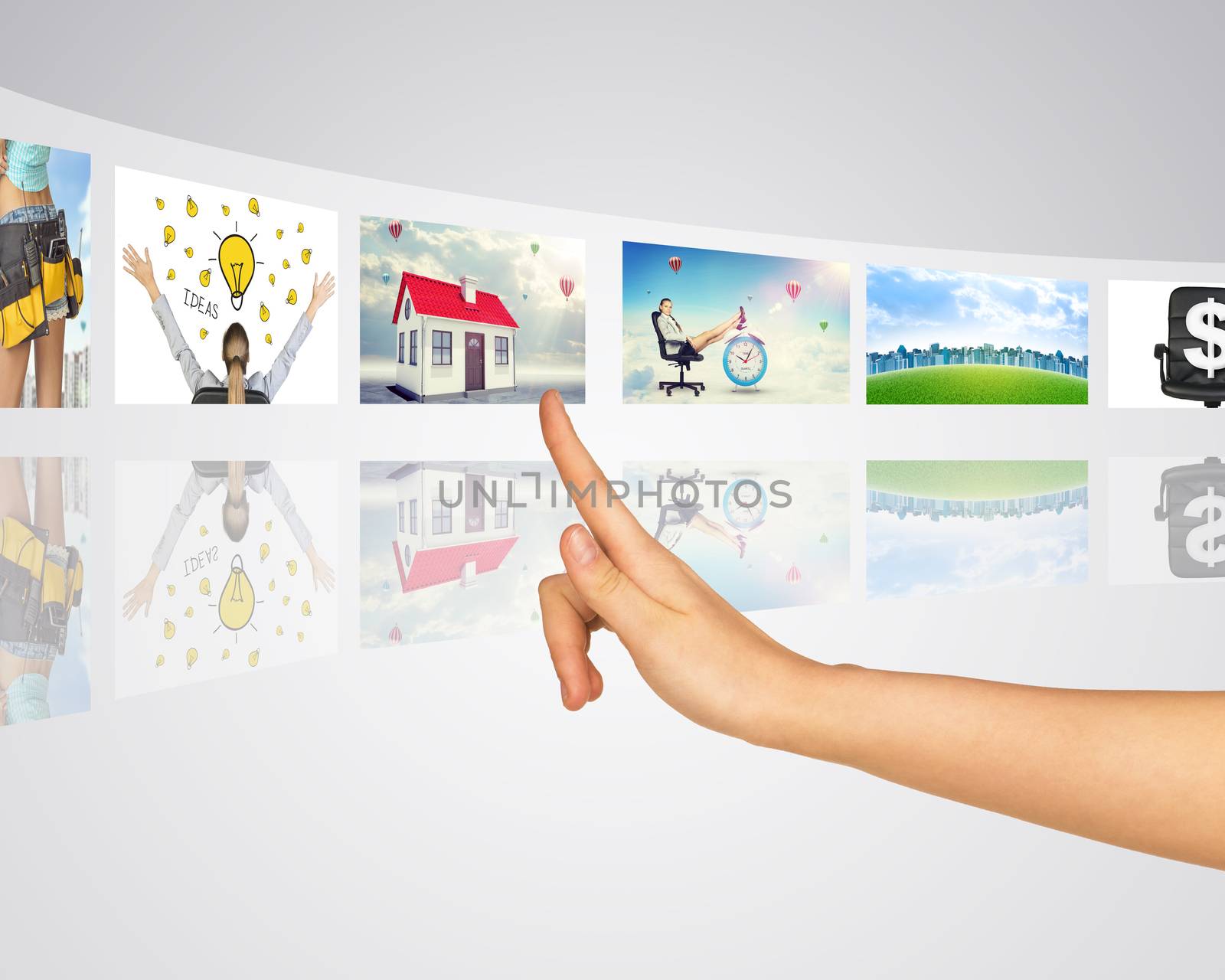 Business lady and buildings. Finger presses one of virtual screens. Mirror reflection