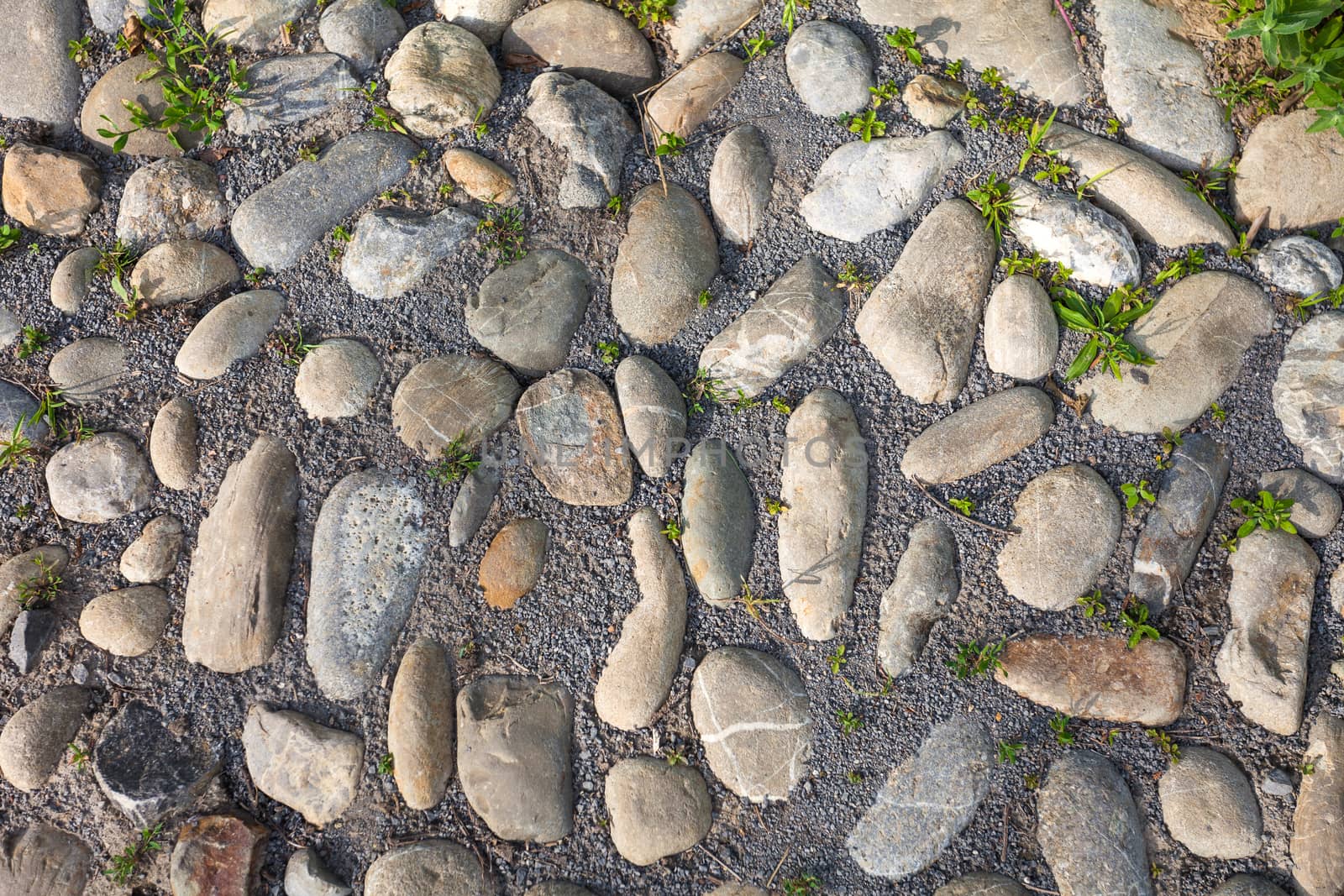 River rough stones pavement background