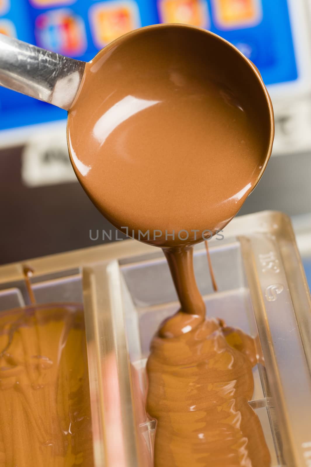 Mixed chocolate poured on bar mold