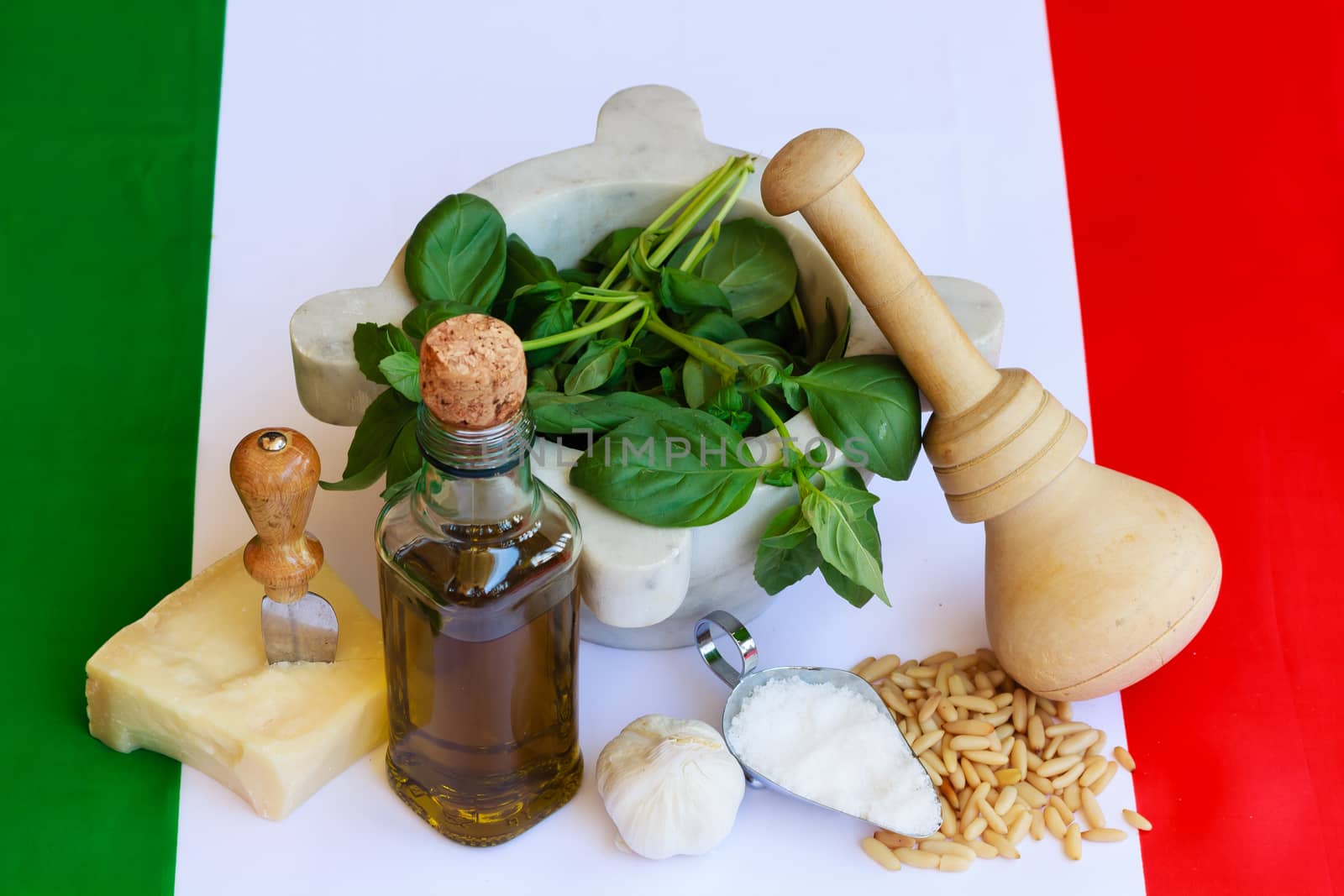 the basic ingredients of italian pesto are:pine-nuts,basil,cheese,salt,garlic,oil,