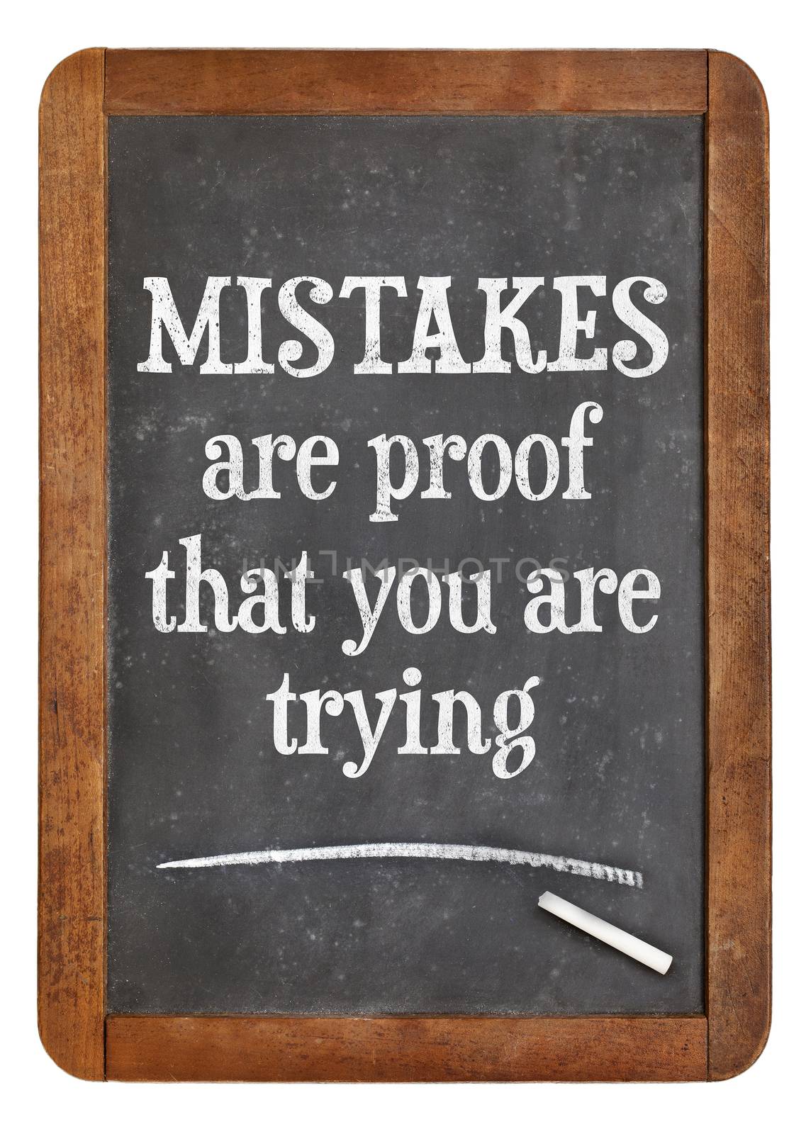 Mistakes are proof that you are trying - motivational text on a vintage slate blackboard