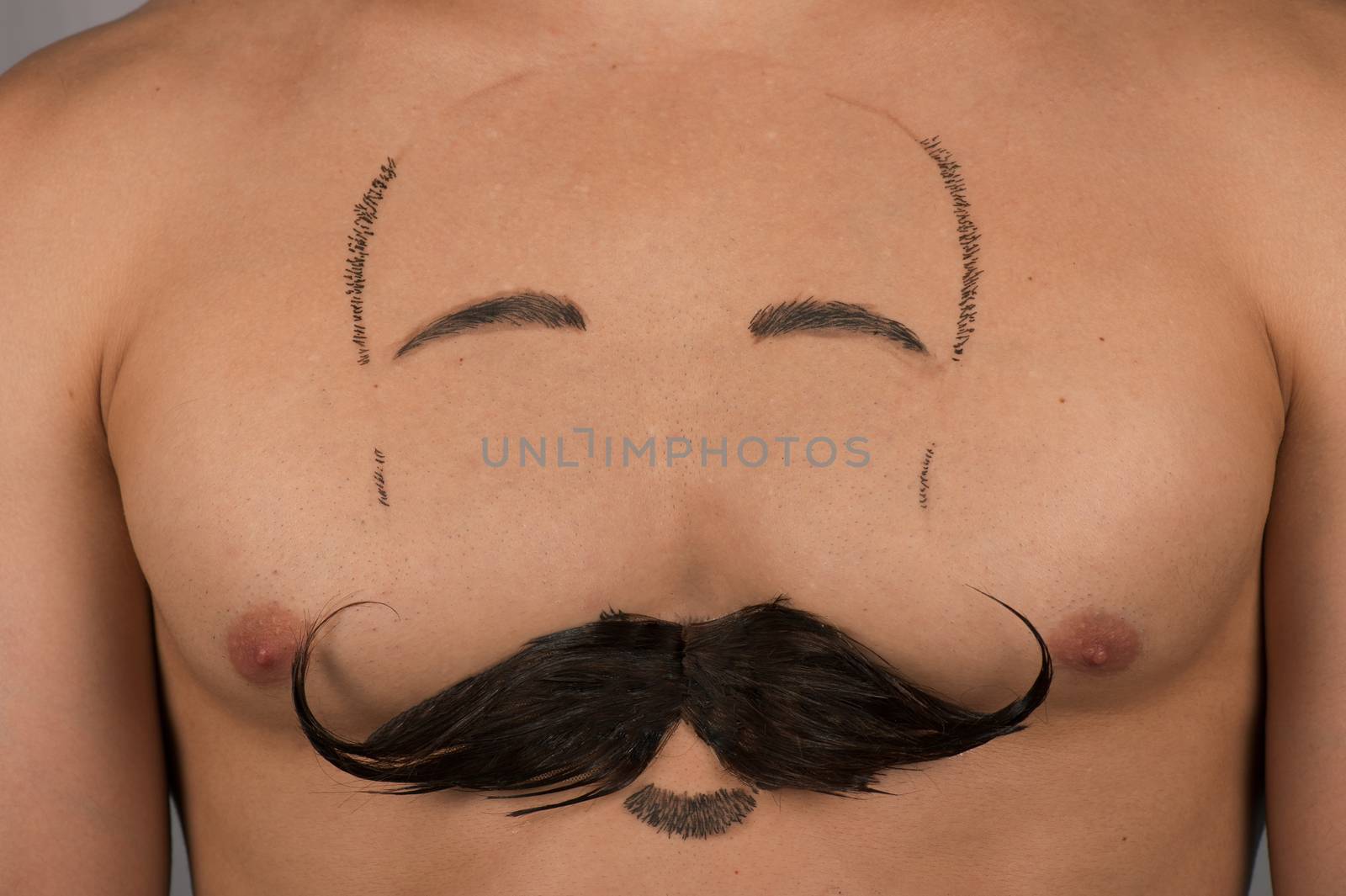 male torso with moustache and beard at chest