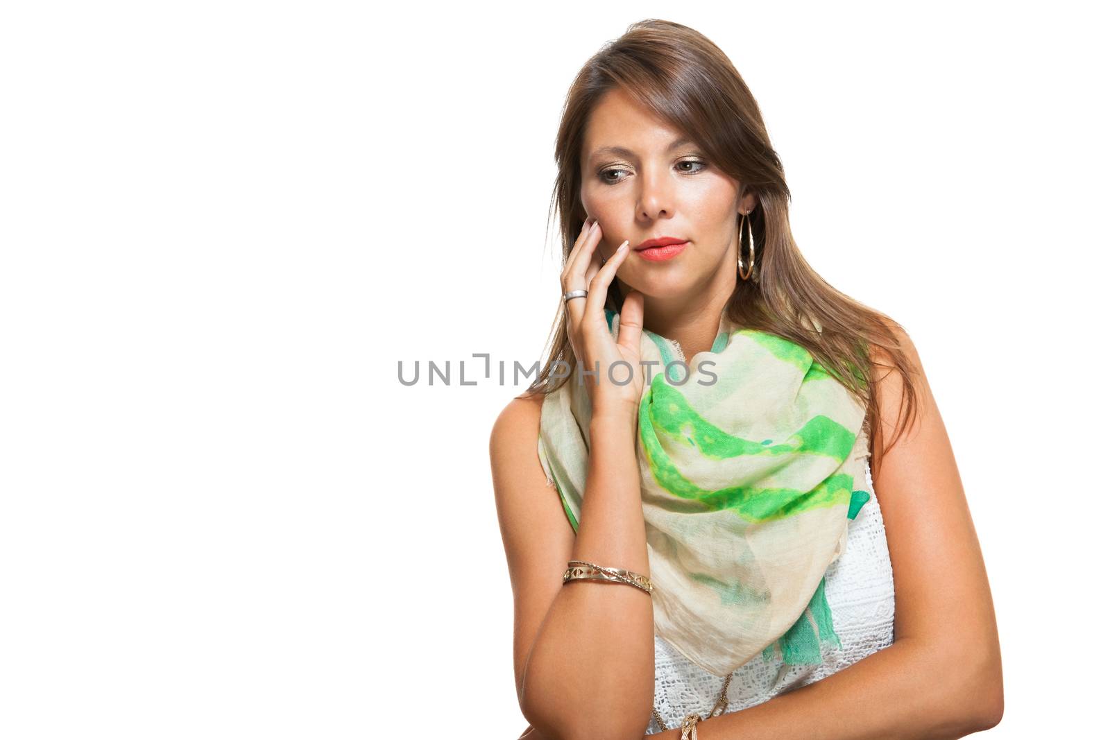 Close up Pensive Pretty Woman in Fashionable Outfit,Touching her Face While Looking Down. Isolated on White Background.