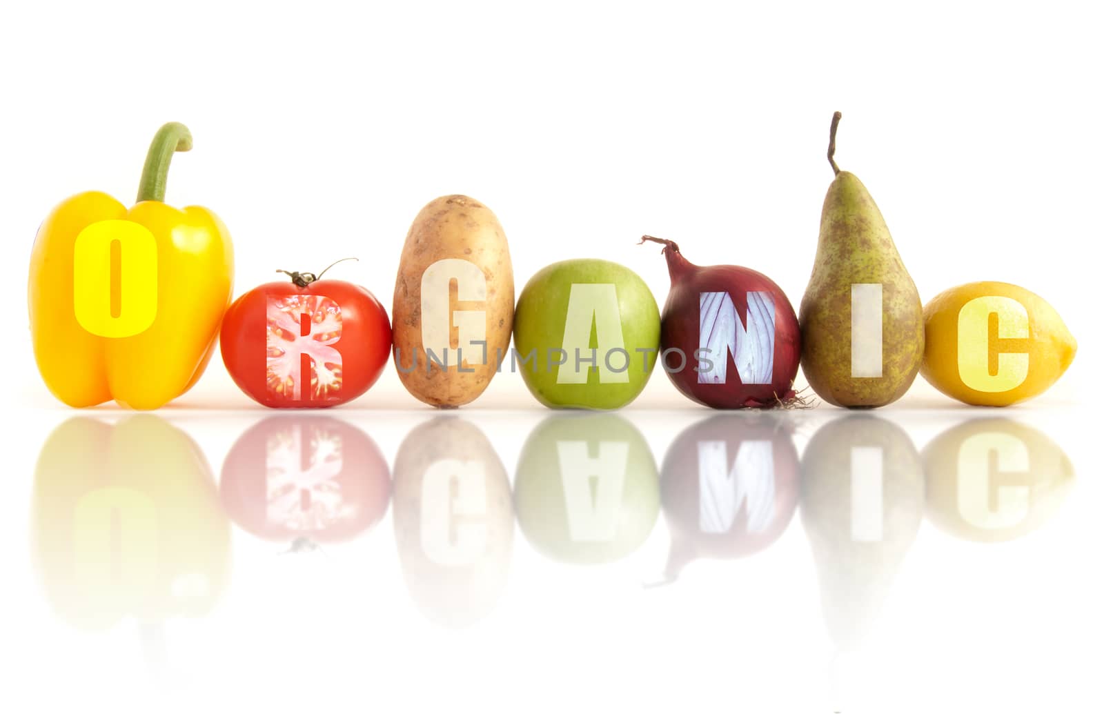 Organic word written using a row of fruits and vegetables over a white background 