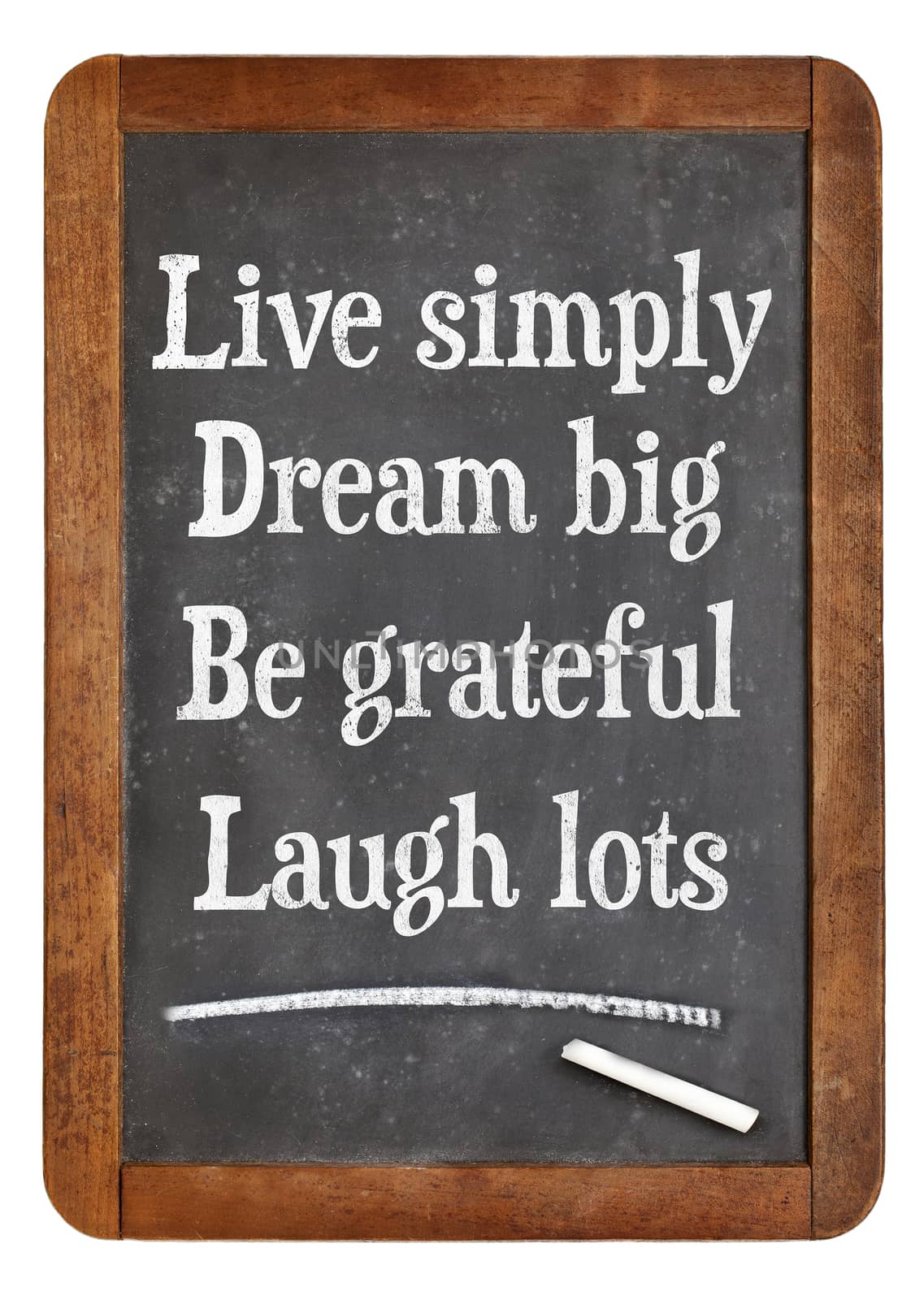 Live simply, dream big, be grateful, laugh lots. Motivational words on a vintage slate blackboard