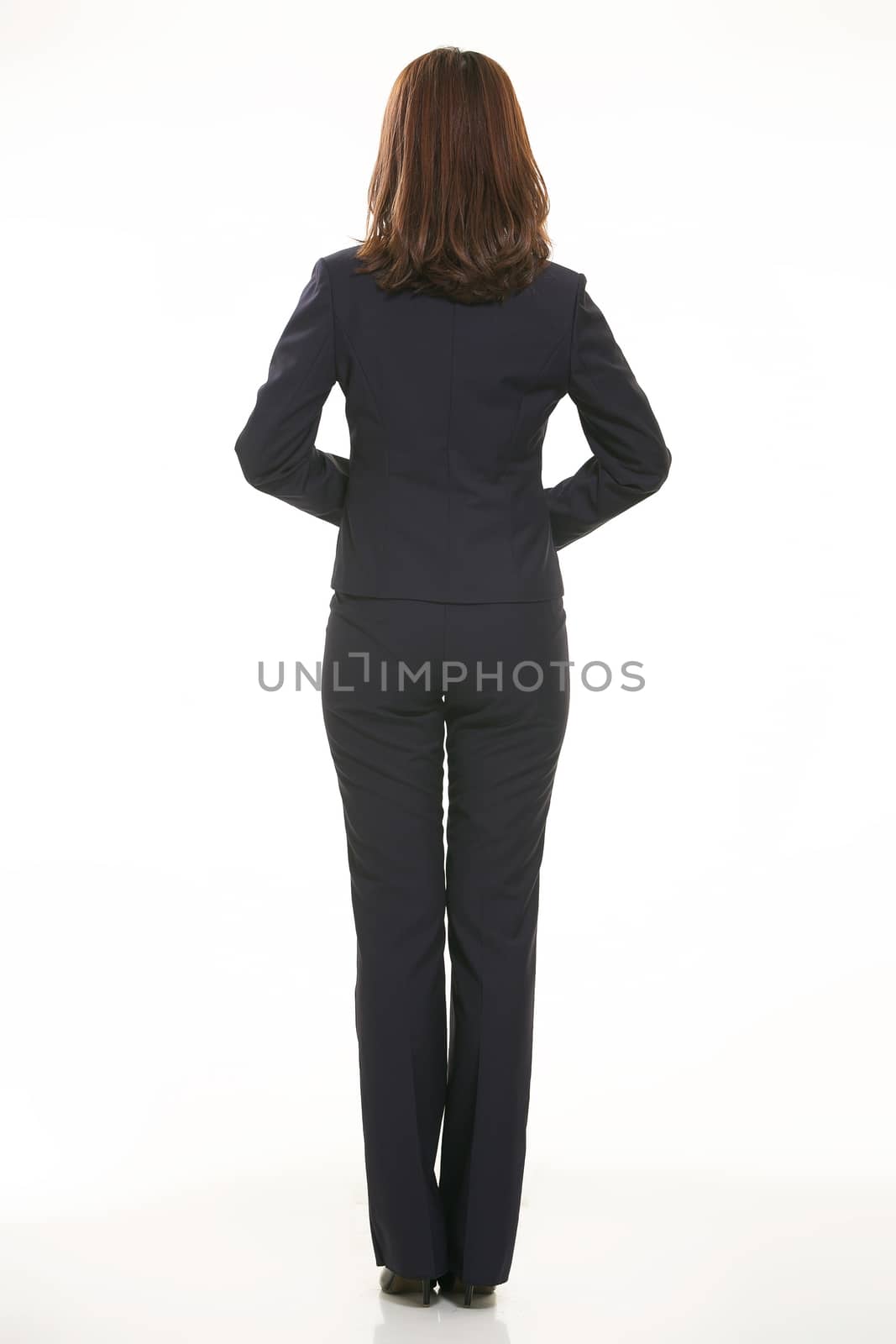 Young Asian women wearing a suit in front of a white background by quweichang